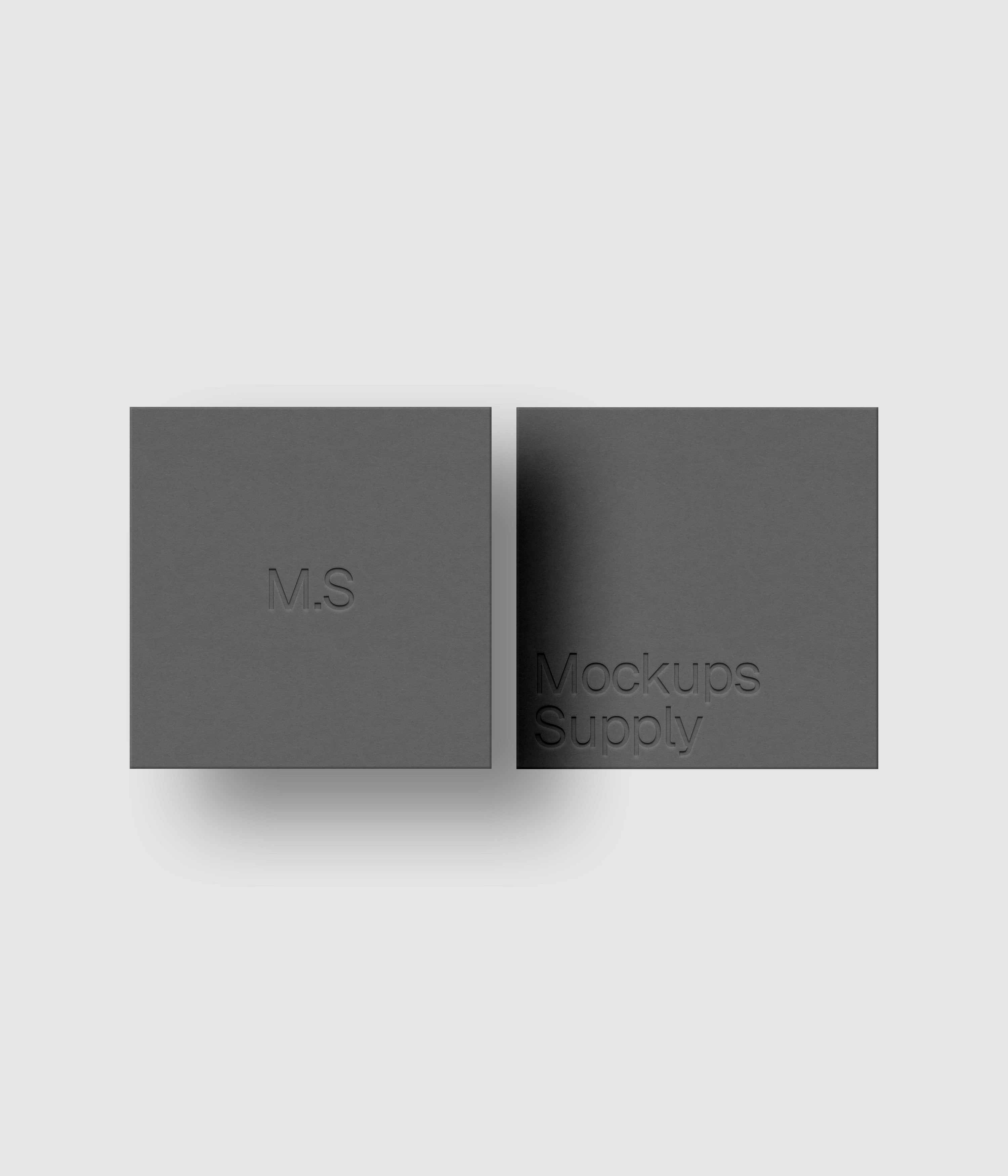 Two square business cards mockup PSD in row with debossed logo and soft shadow, gray cards on white background, clean modern stationery mockup for brand identity