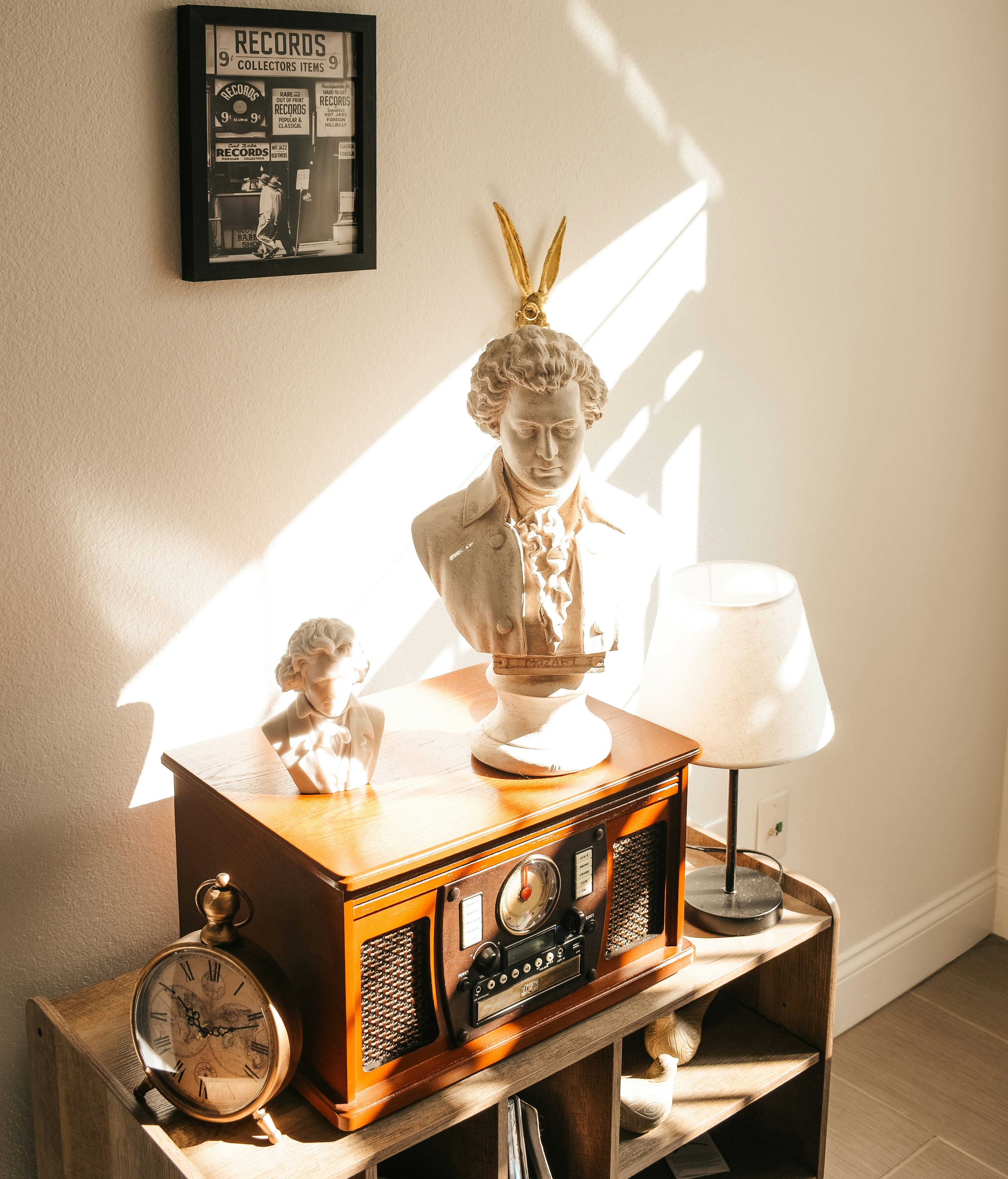 Busts on antique radio with sunlight