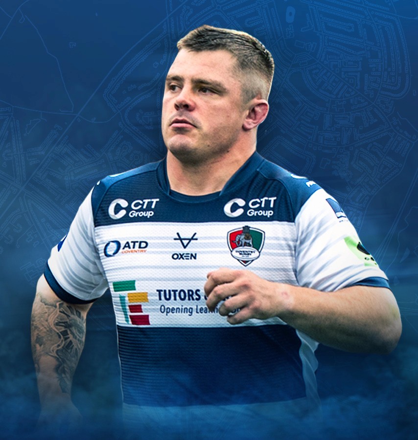 group of men playing soccer during daytime