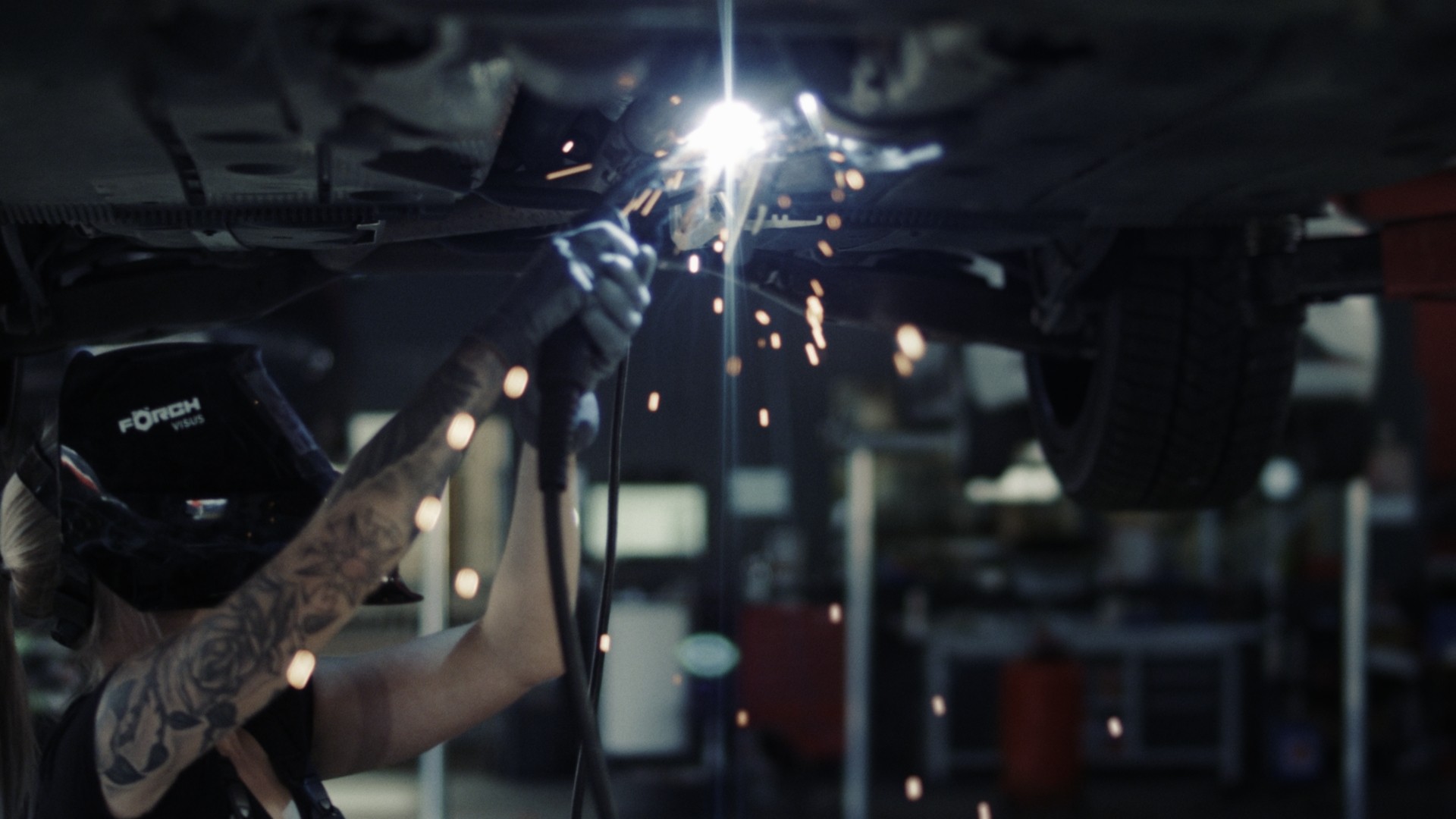 A mockup of a Macbook for the about us page of the hair salon website