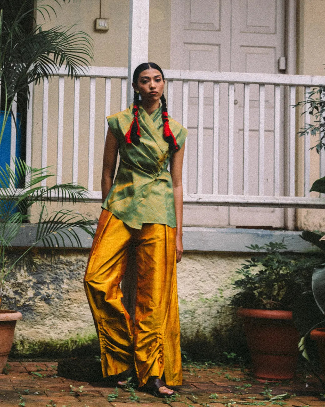 Nivah wide draped trousers gathered at hem for graceful, fluid movement.