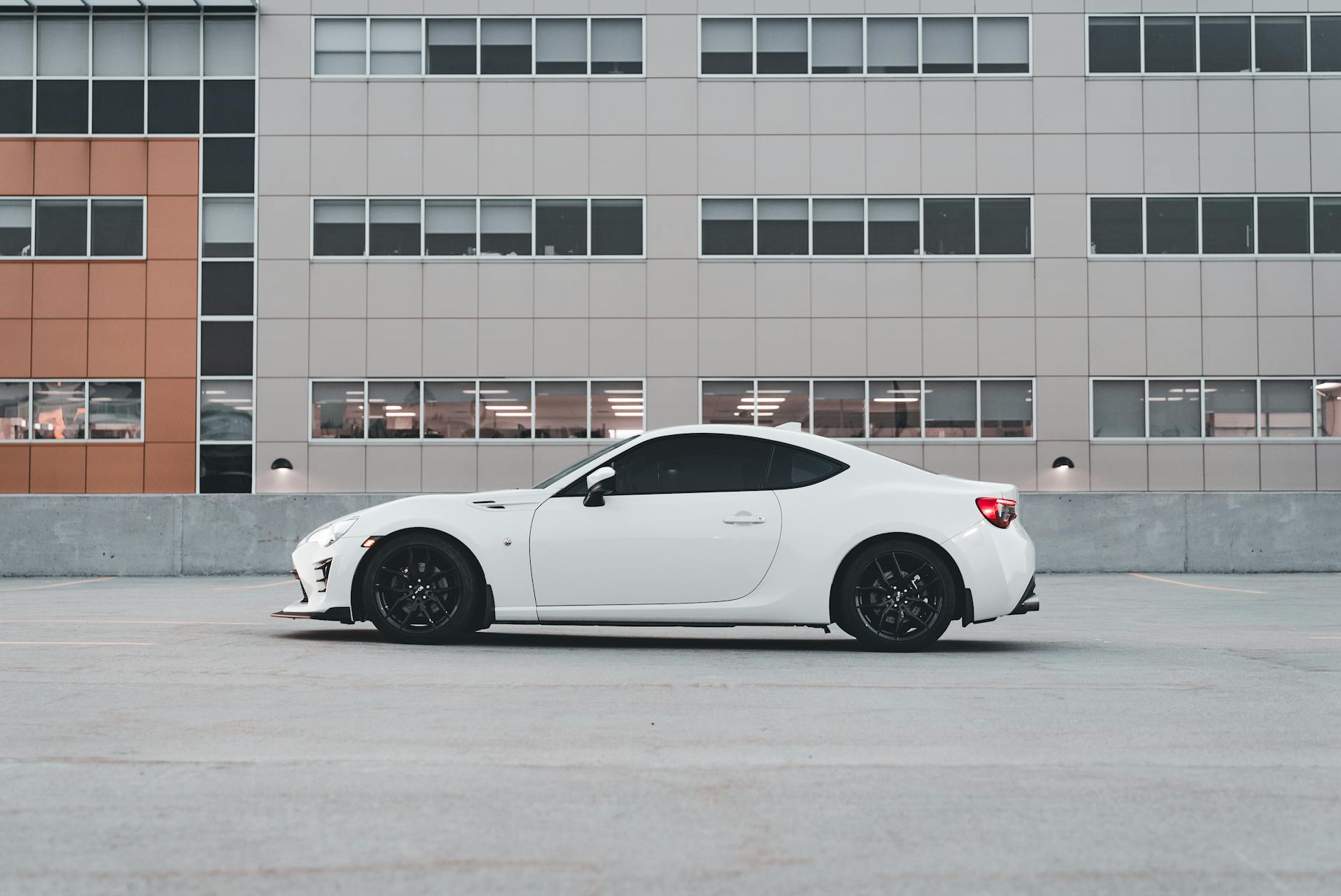 A white car is on the way