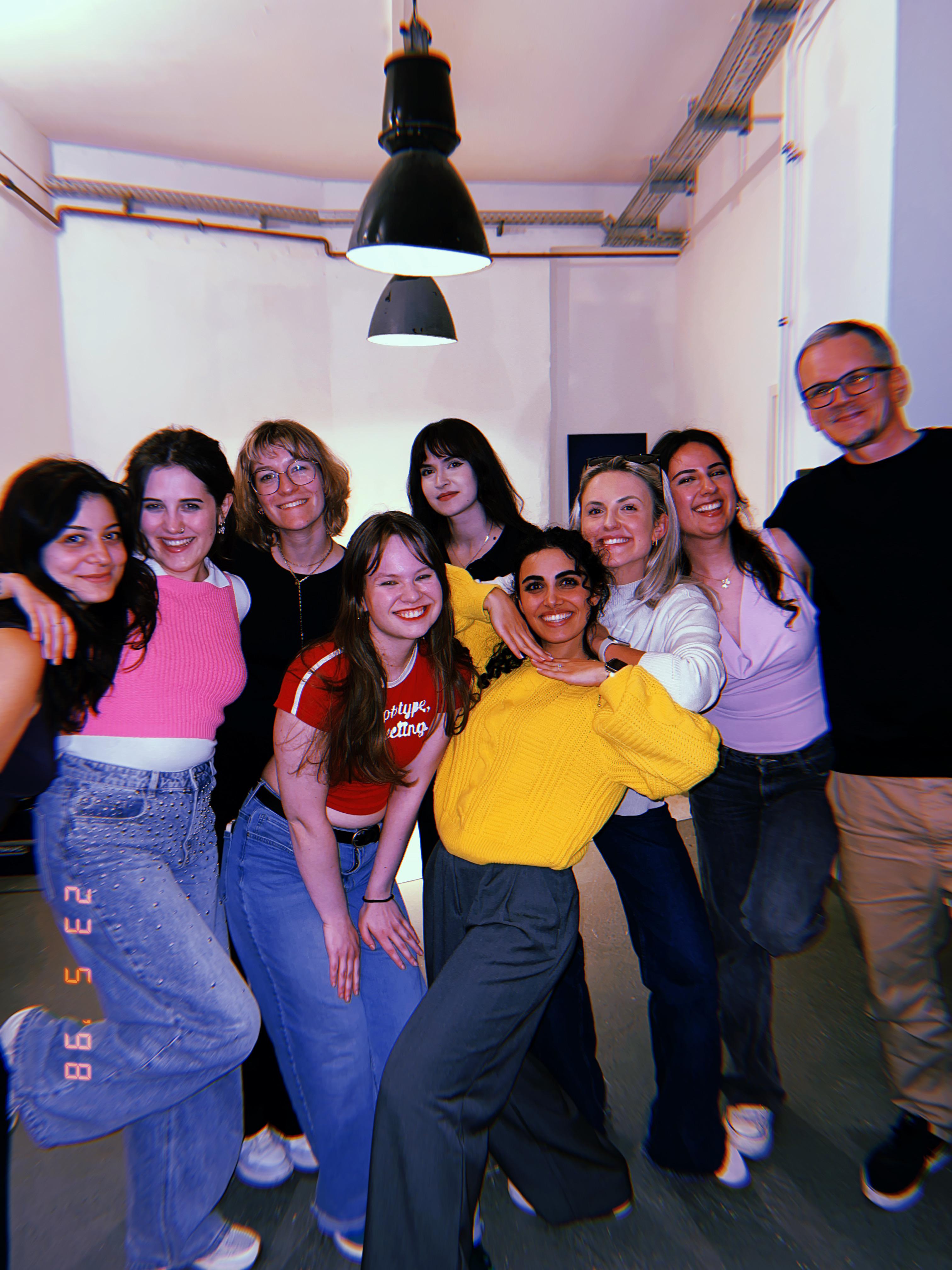Person sitting on a ledge overlooking New York City skyline
