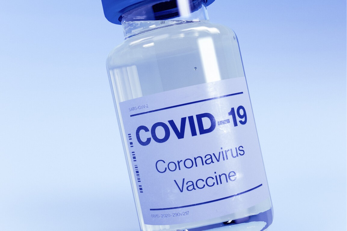 COVID-19 vaccine bottle blue