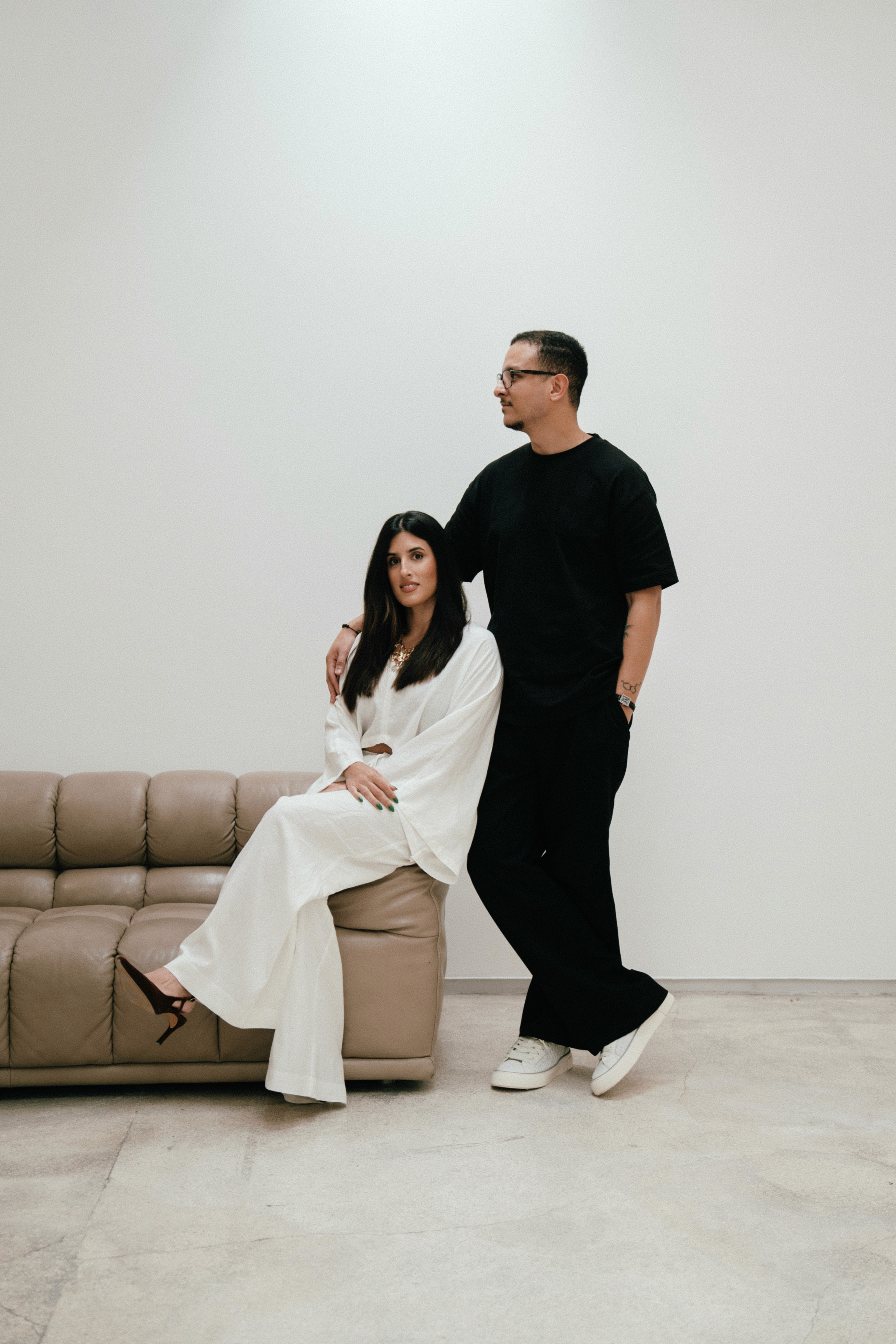 Blue chairs in a neat row against a light gray background, creating a minimalist and modern aesthetic.