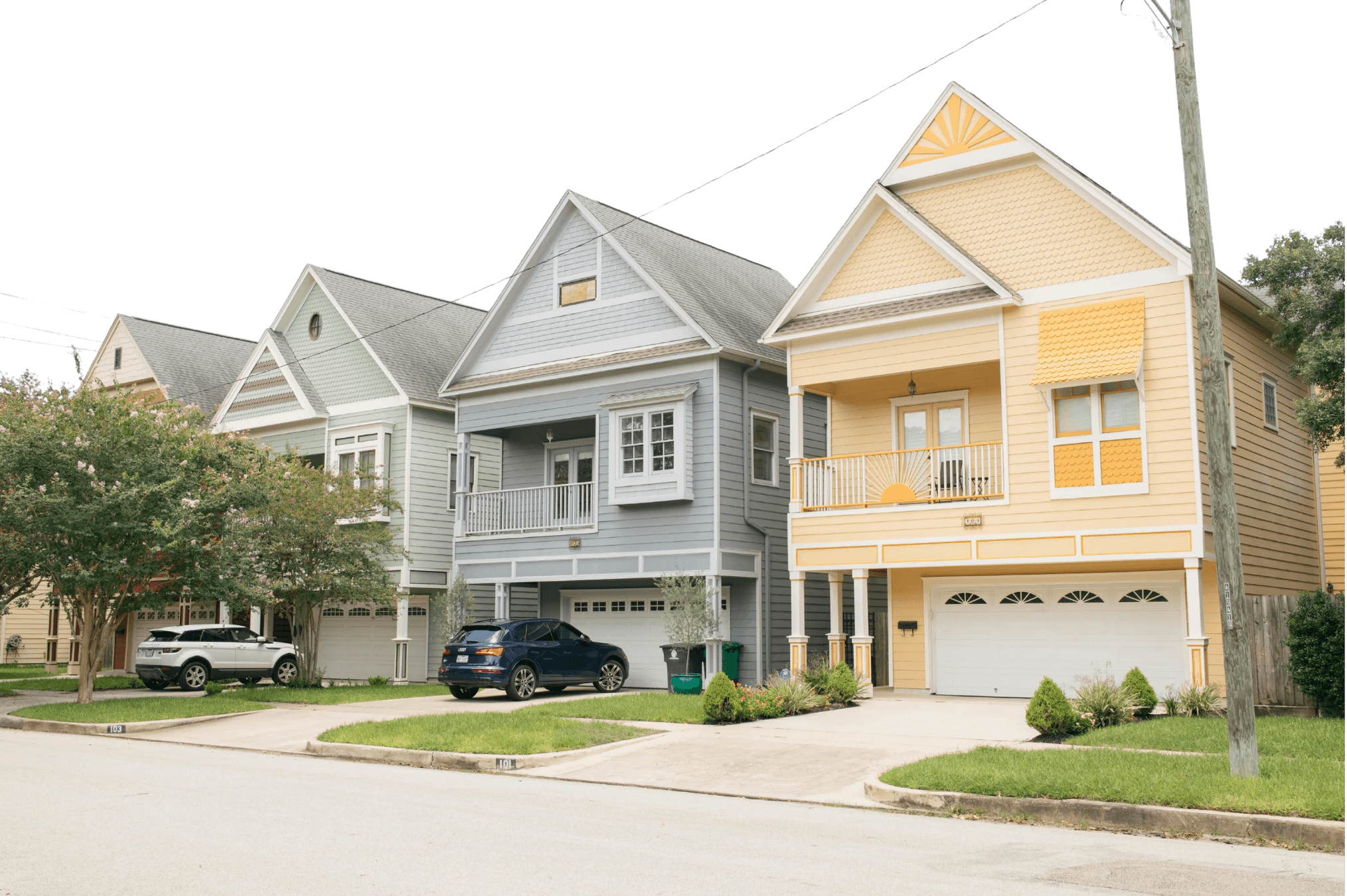 modern sculptural building with curved wooden exterior