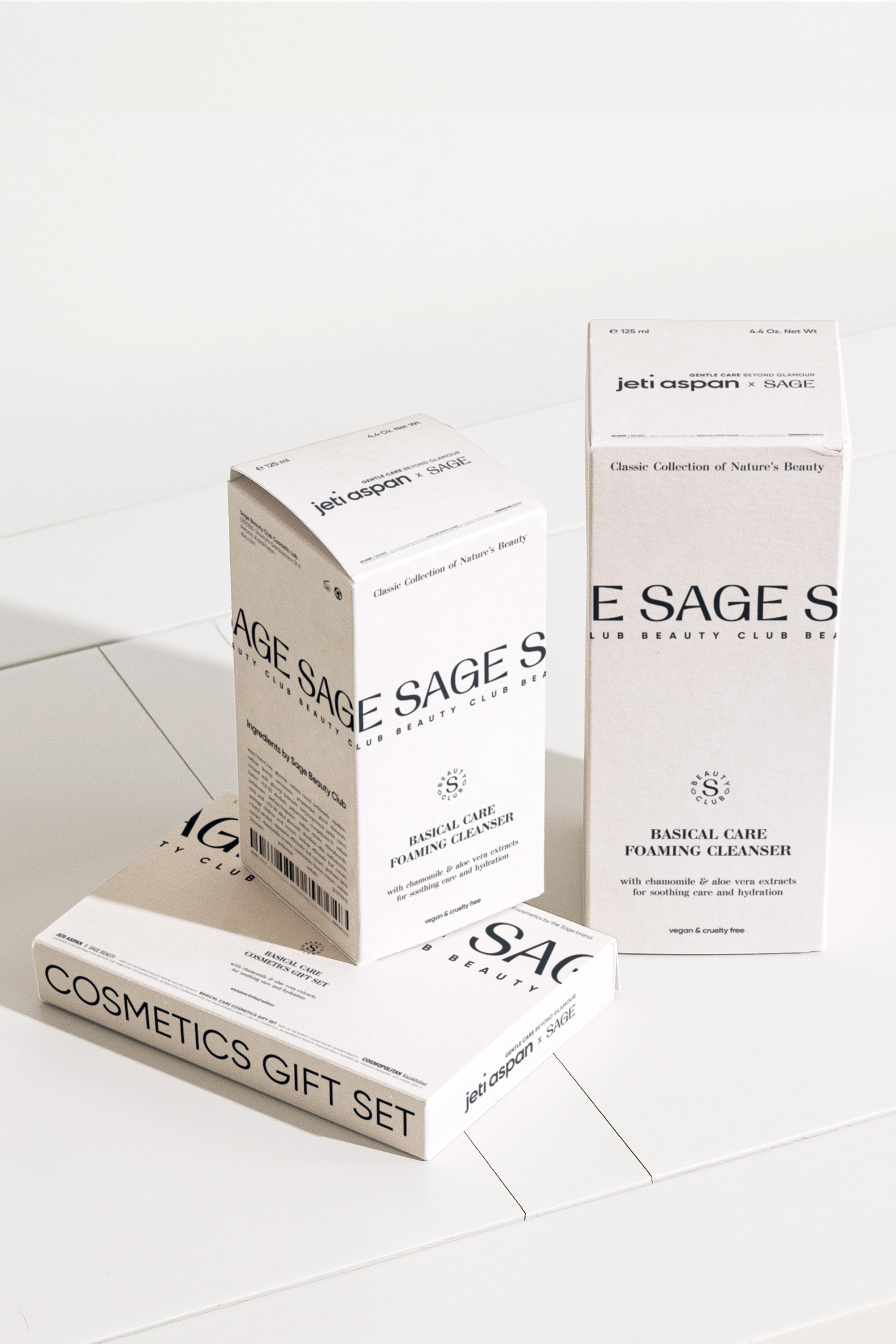 Streetside billboard with flyposters of the Batch.Works brand and illustrations