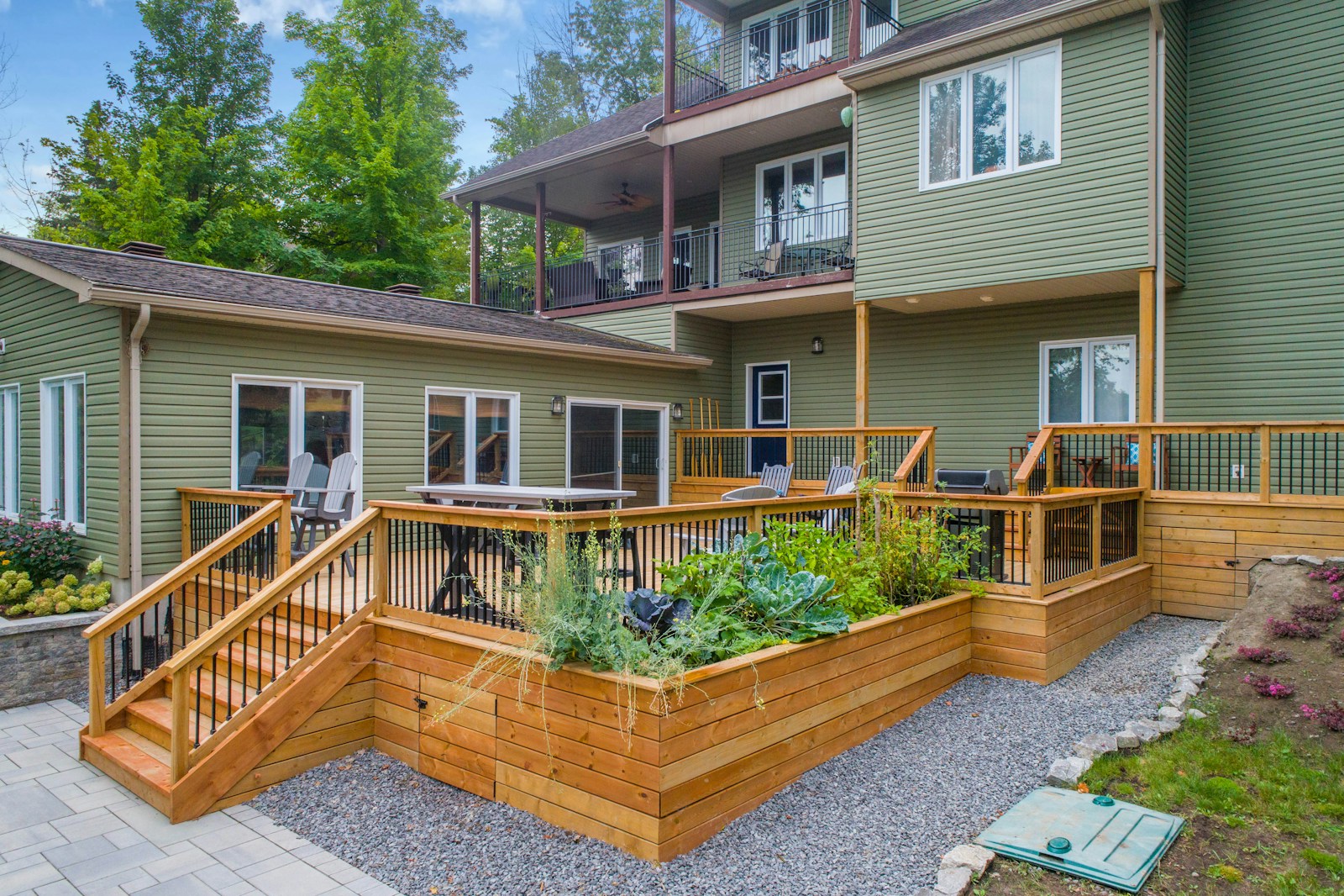 Home with deck and exterior living space