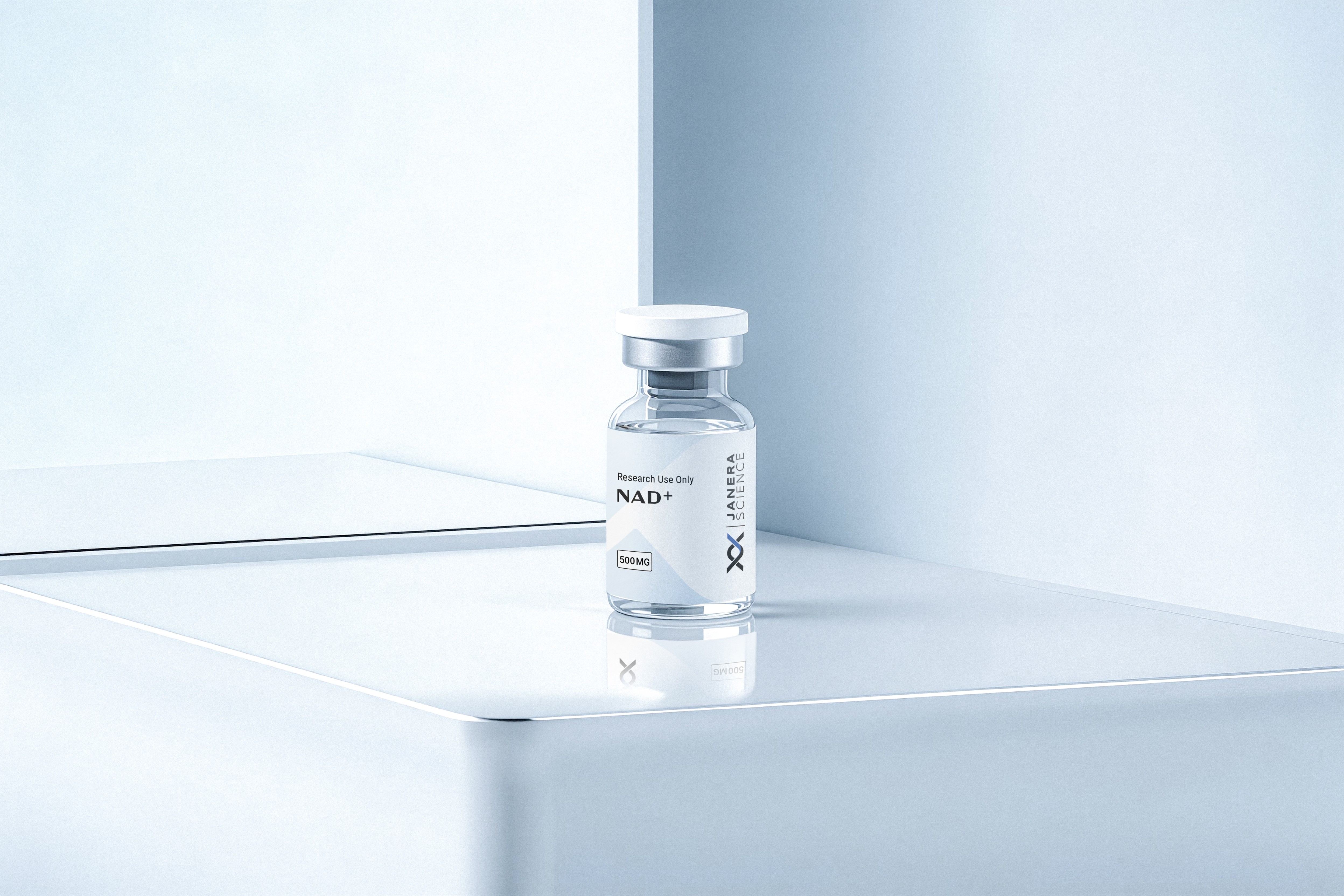 Single Janera Science NAD+ 500mg research peptide vial with white stopper and chrome crimp cap against a soft light gray sterile background. For laboratory research use only.