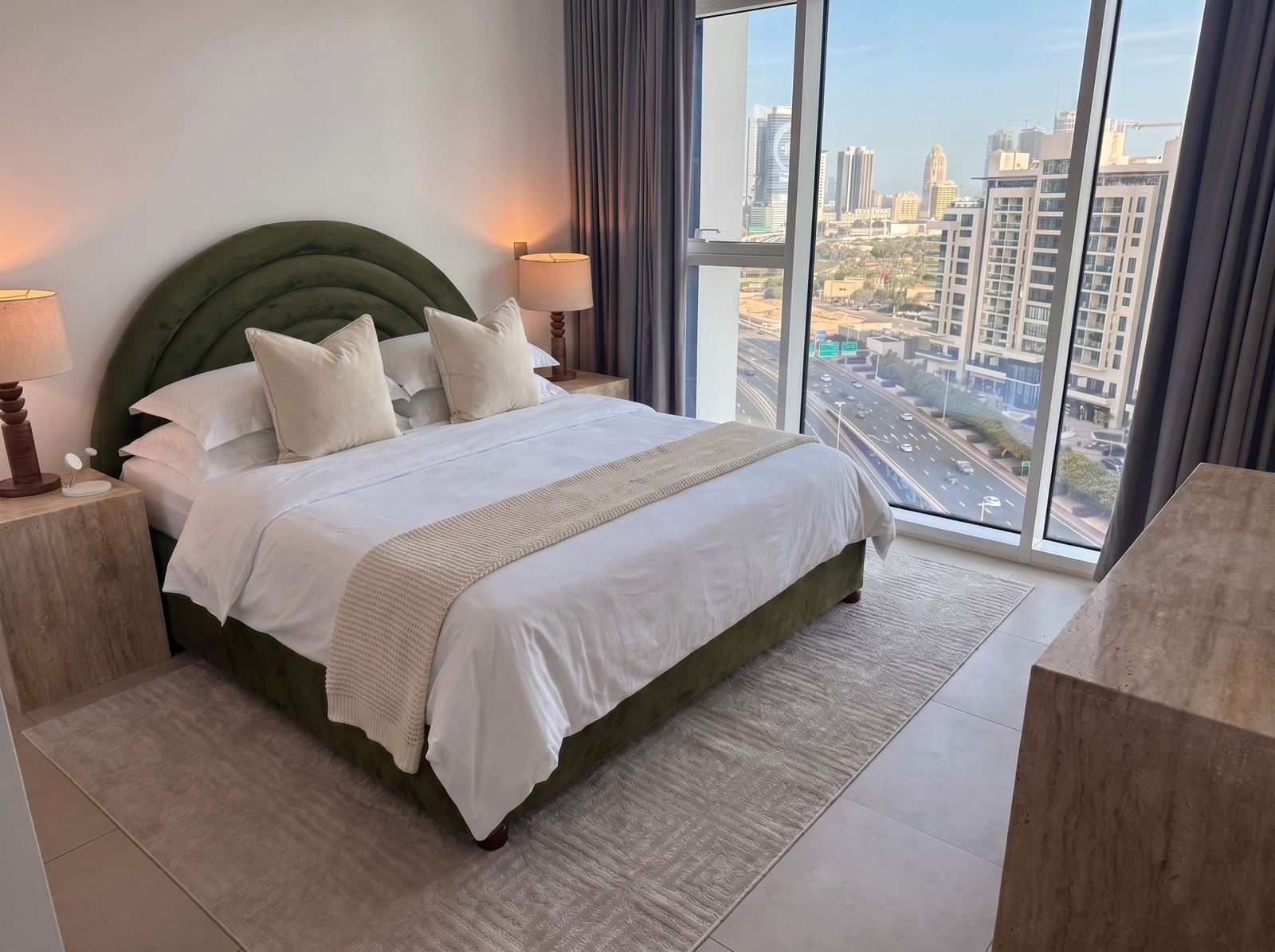 Master bedroom furnished and styled by alto