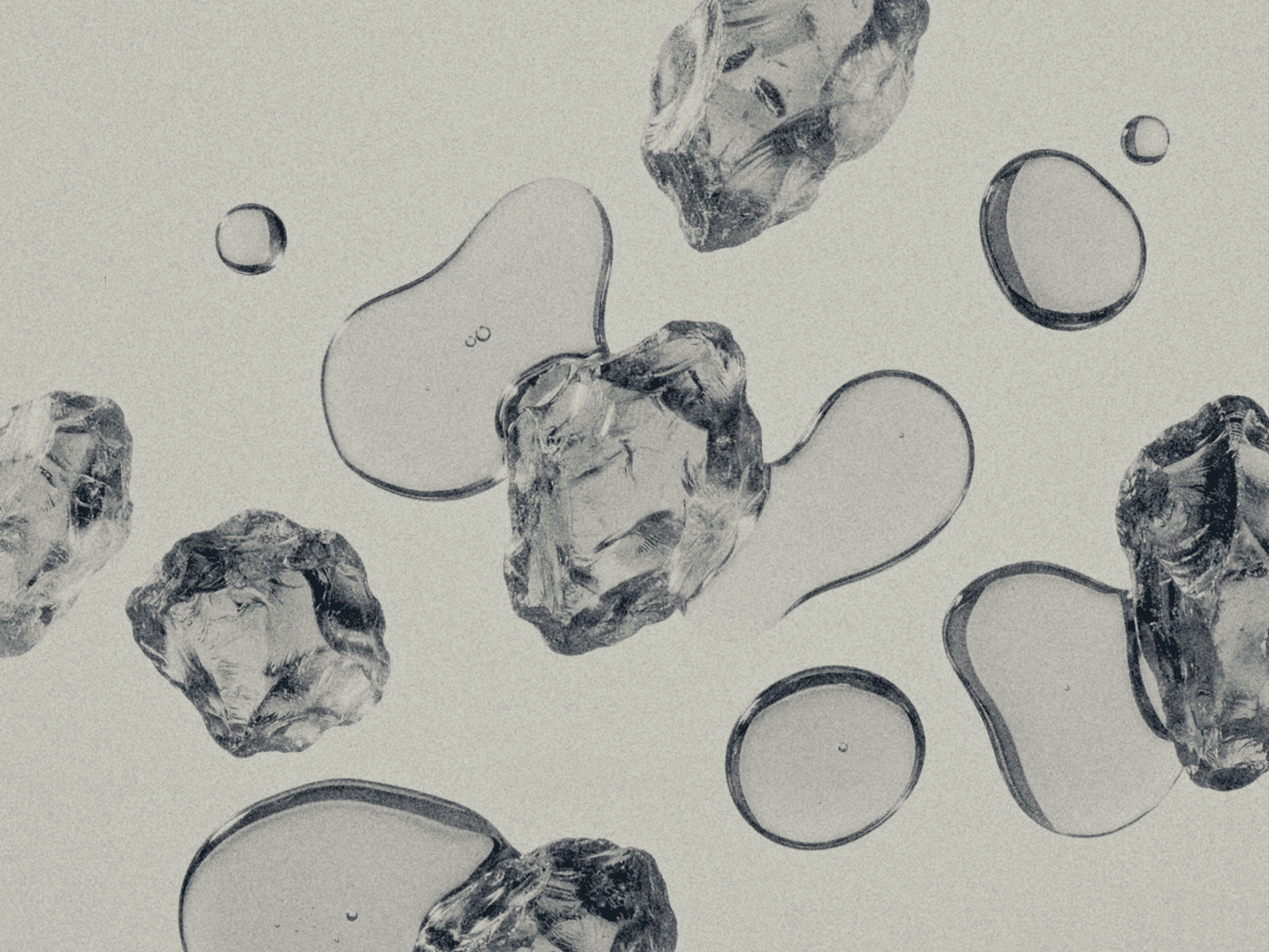 Suspended droplets against a pale background