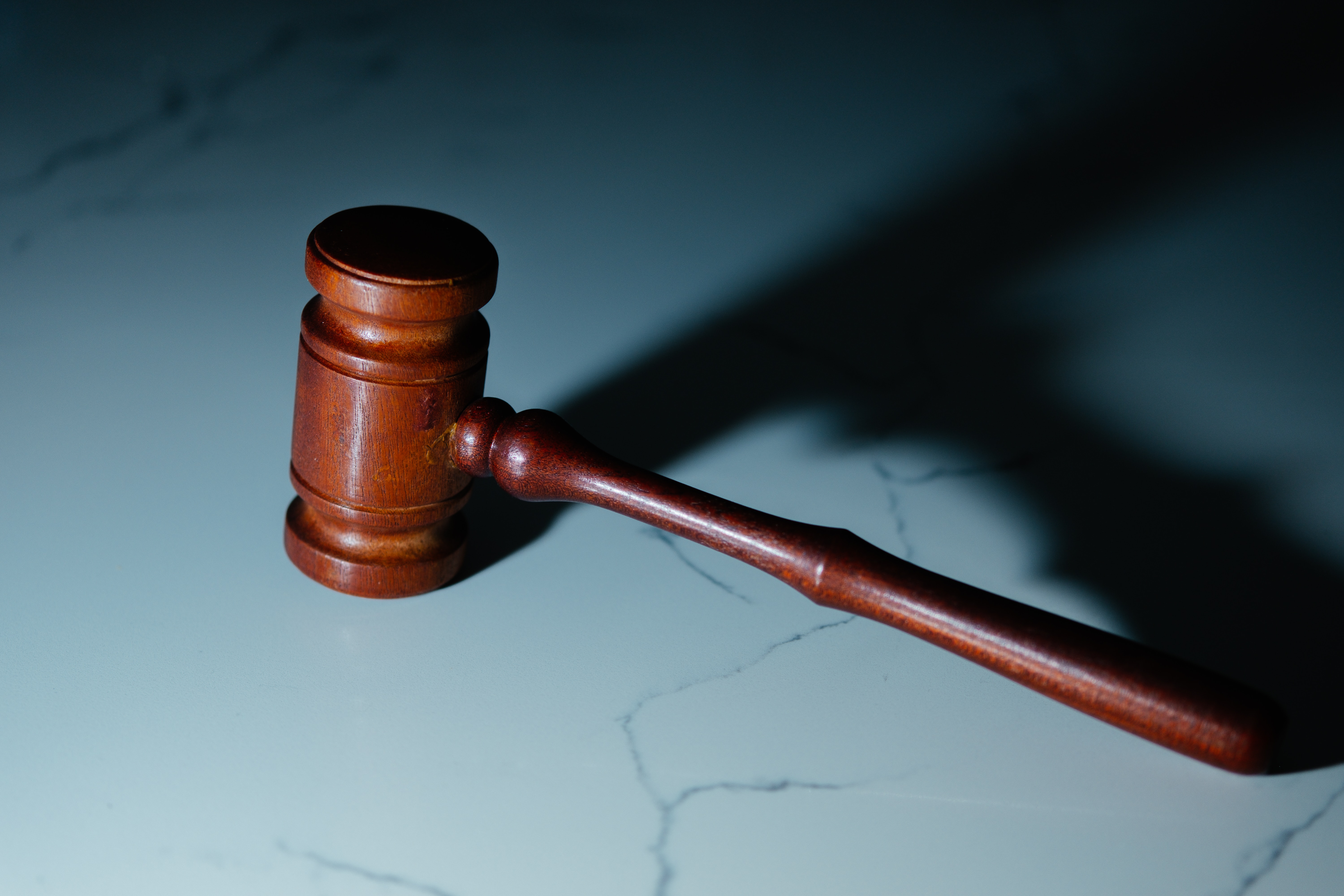 The text highlights the financial and human costs of failing to provide proper medical supervision in contrast radiology, detailing millions in fraud settlements and malpractice verdicts.