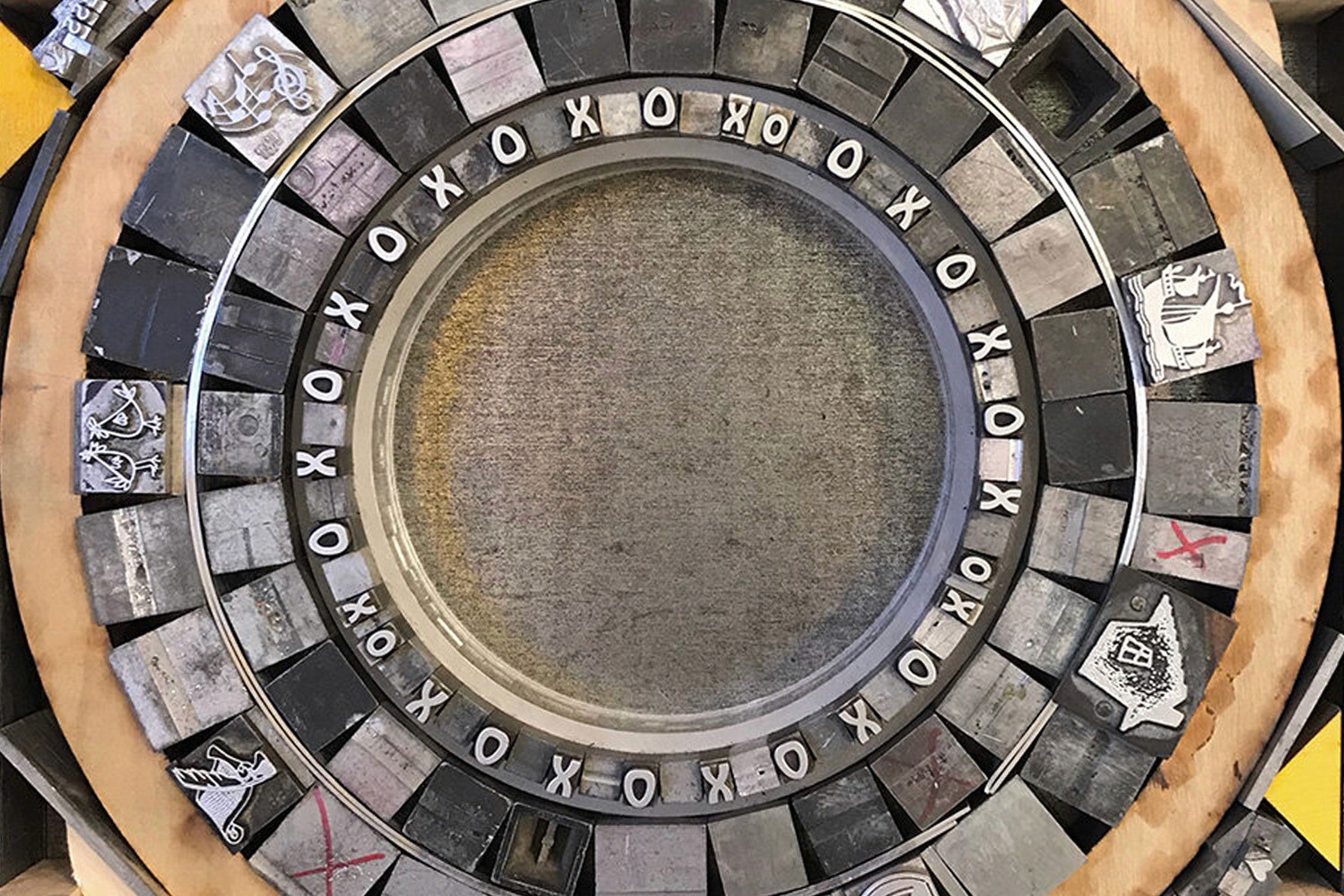 metal type set in a circle
