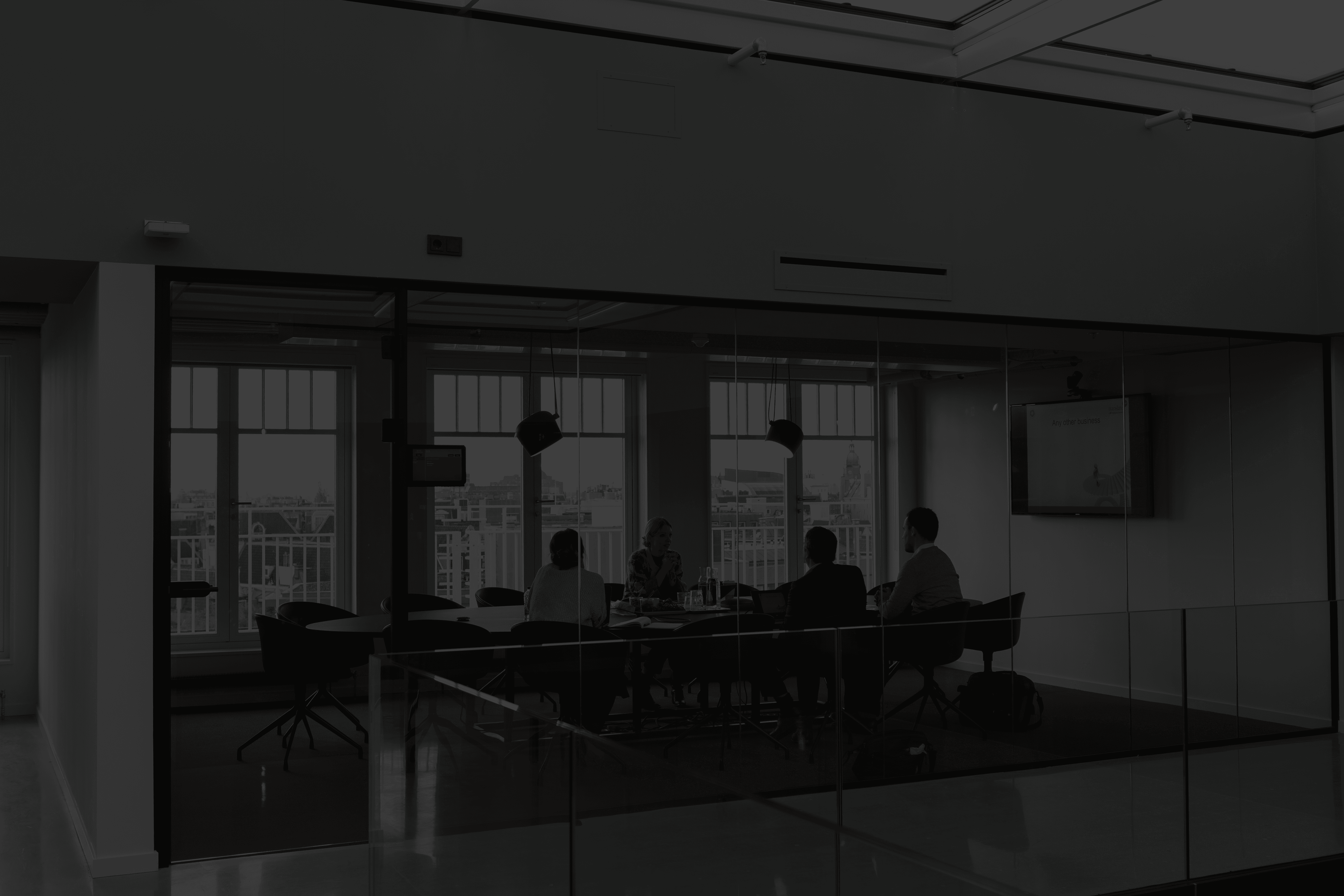 people sitting on chair inside building