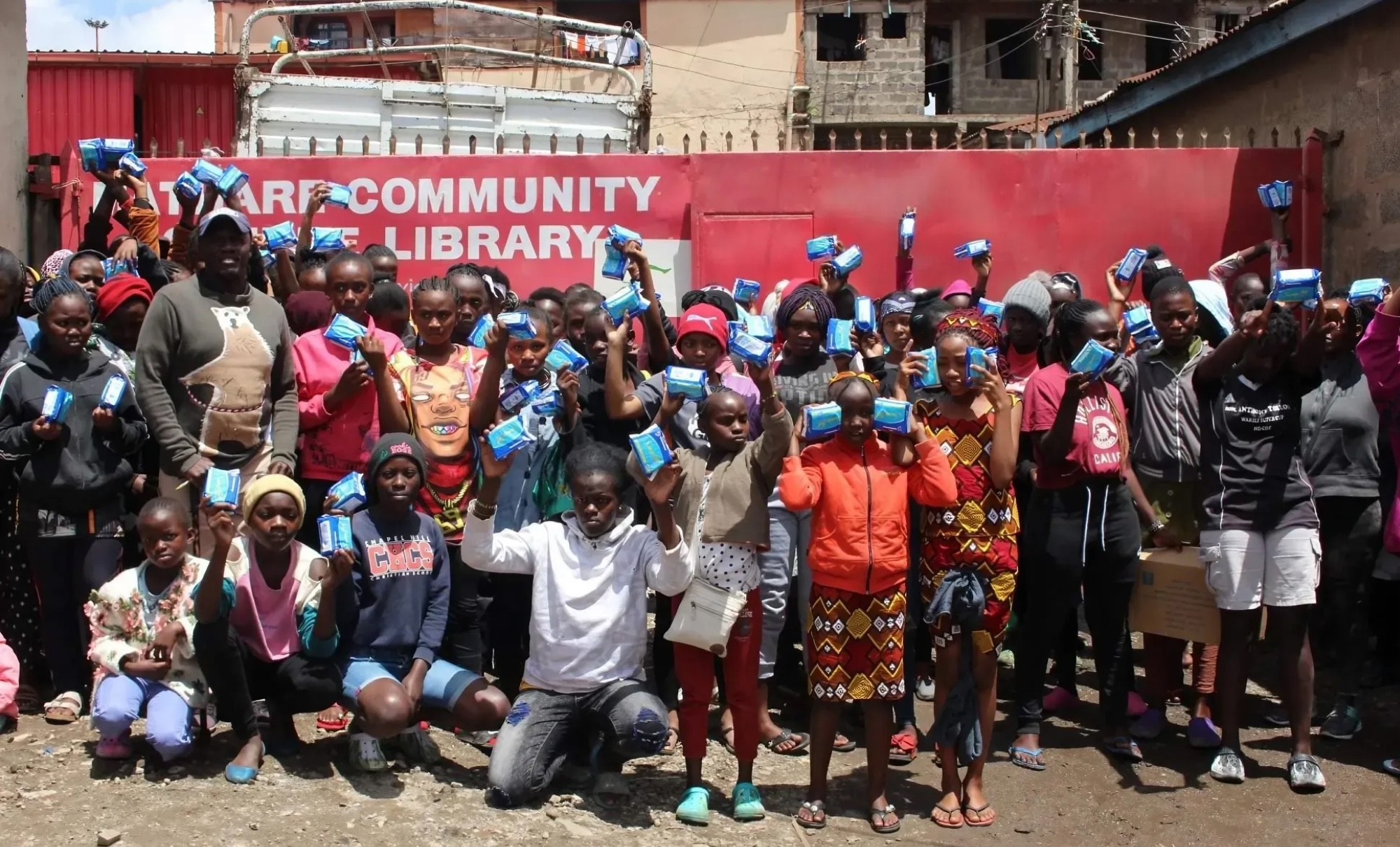Students in front of a newly constructed Mathare community library