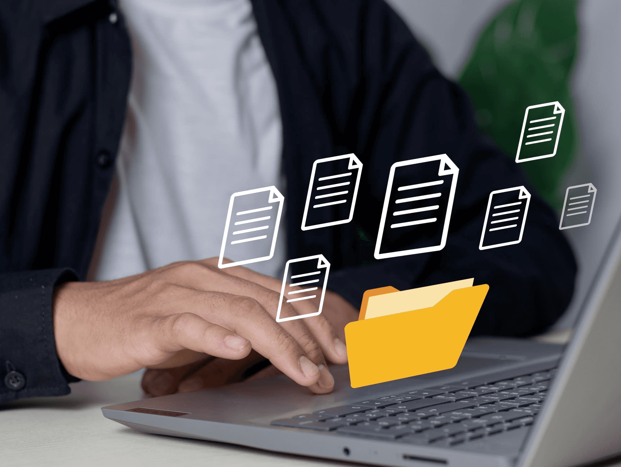 Person organizing digital files into folders - Document Management Best Practices
