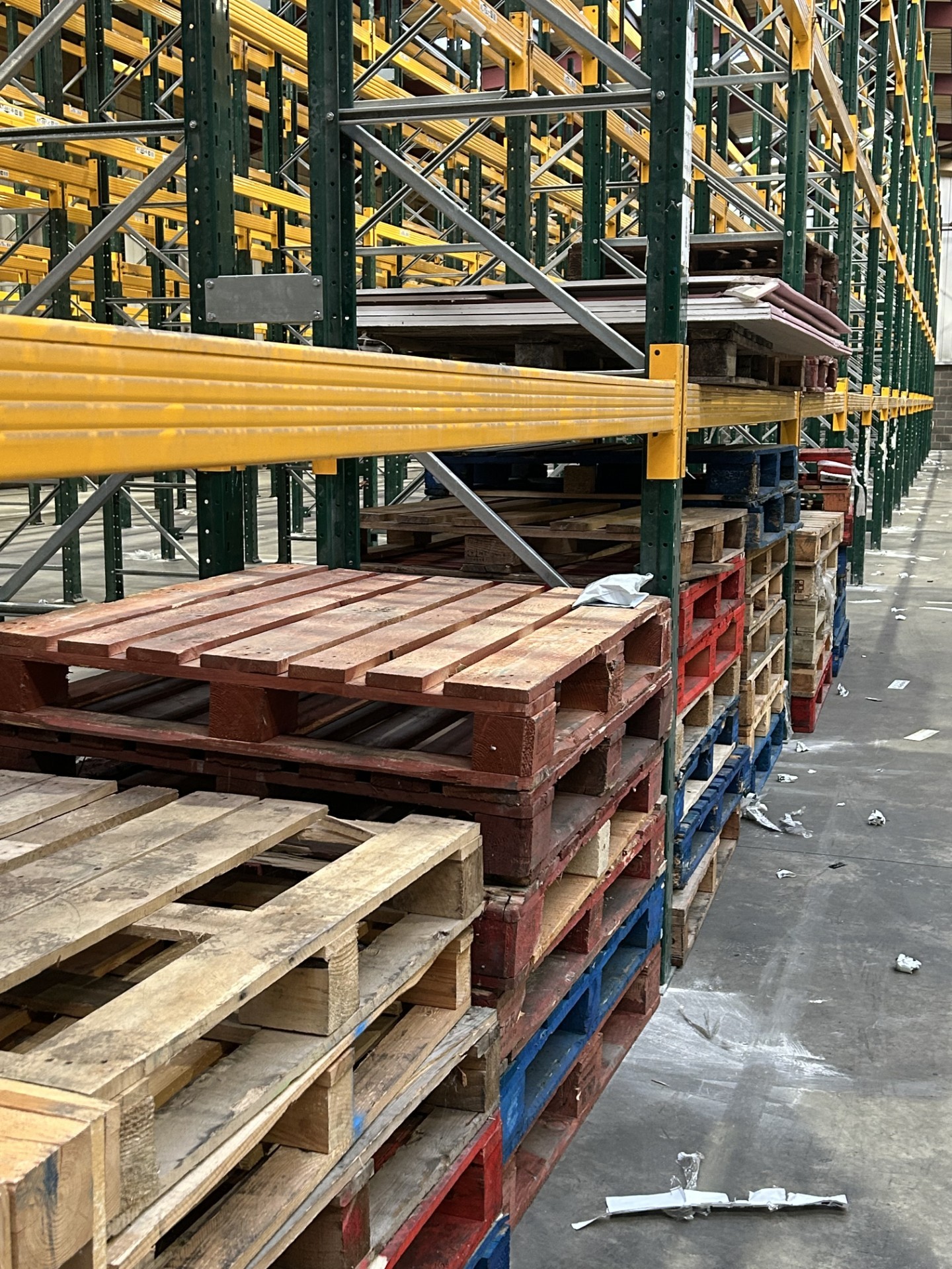 image of empty pallets stored in racking