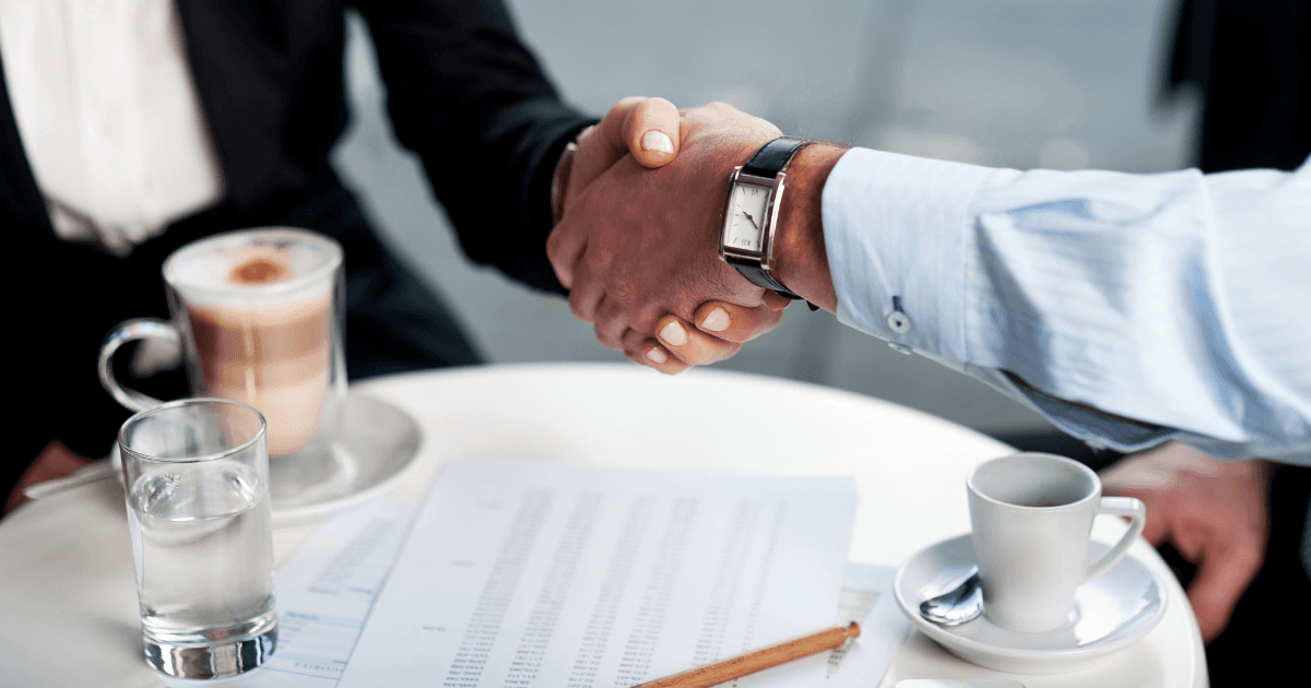A handshake over a business contract
