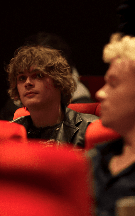 Couple embracing on street, bride's face obscured