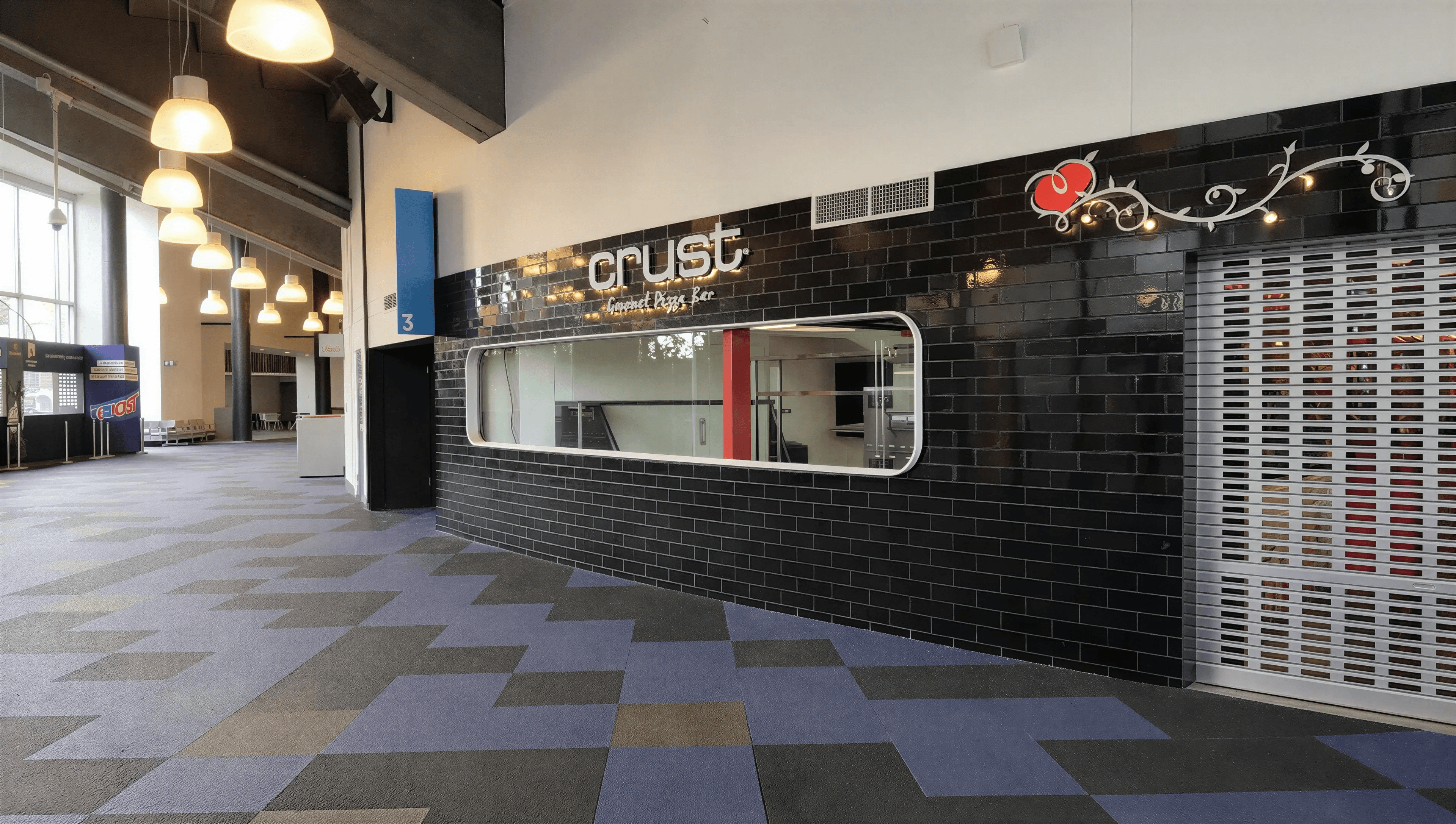 Crust Gourmet Pizza Bar tenancy frontage at Rod Laver Arena, Melbourne.