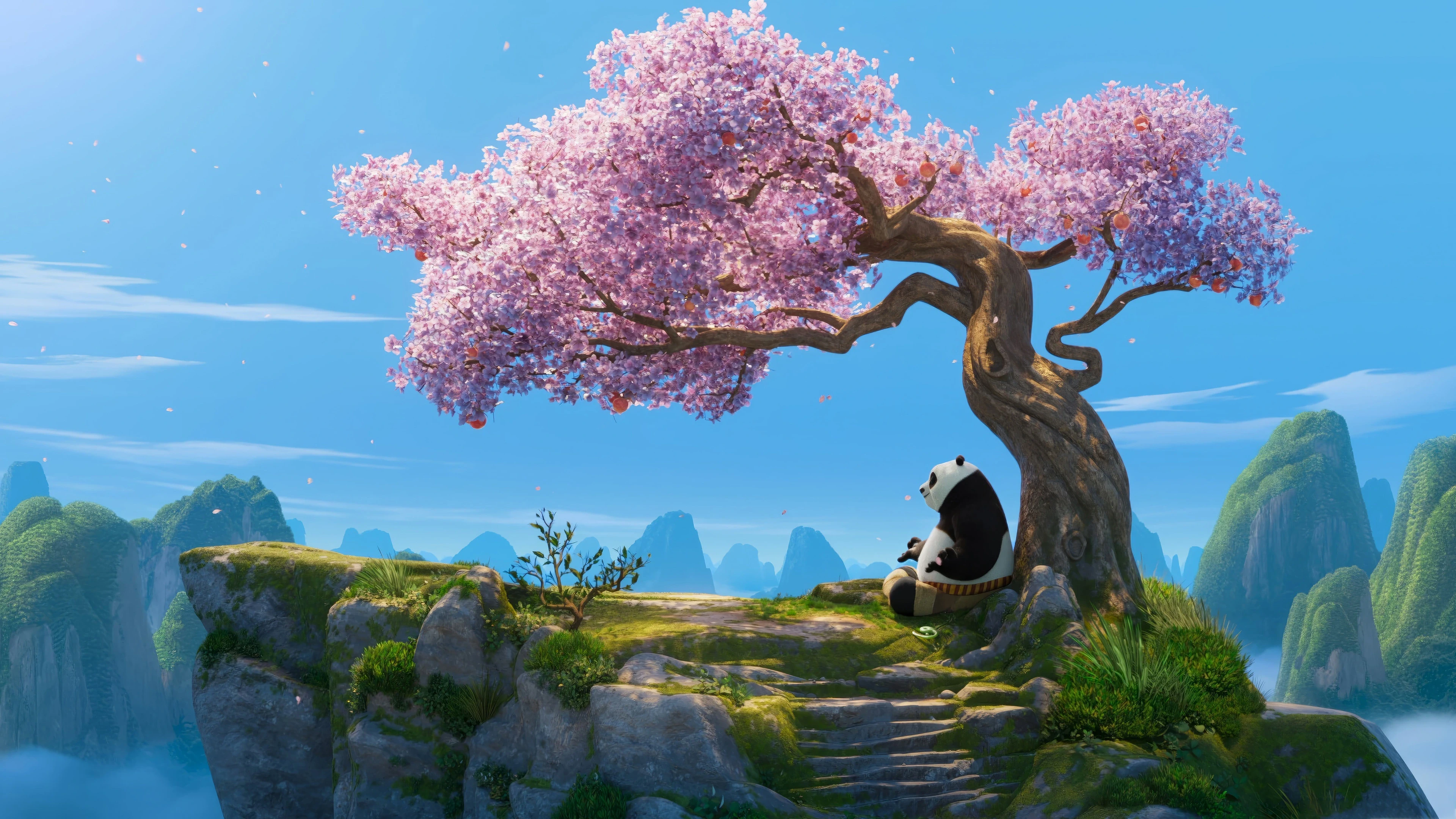 Panda sitting under tree
