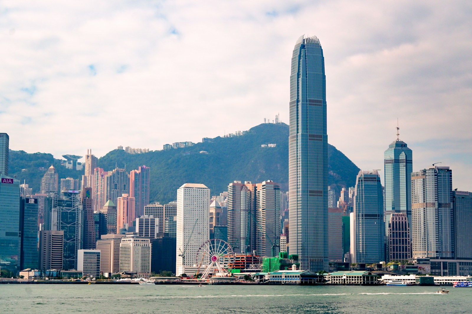 Hong Kong financial district skyline, harbor and mountains
