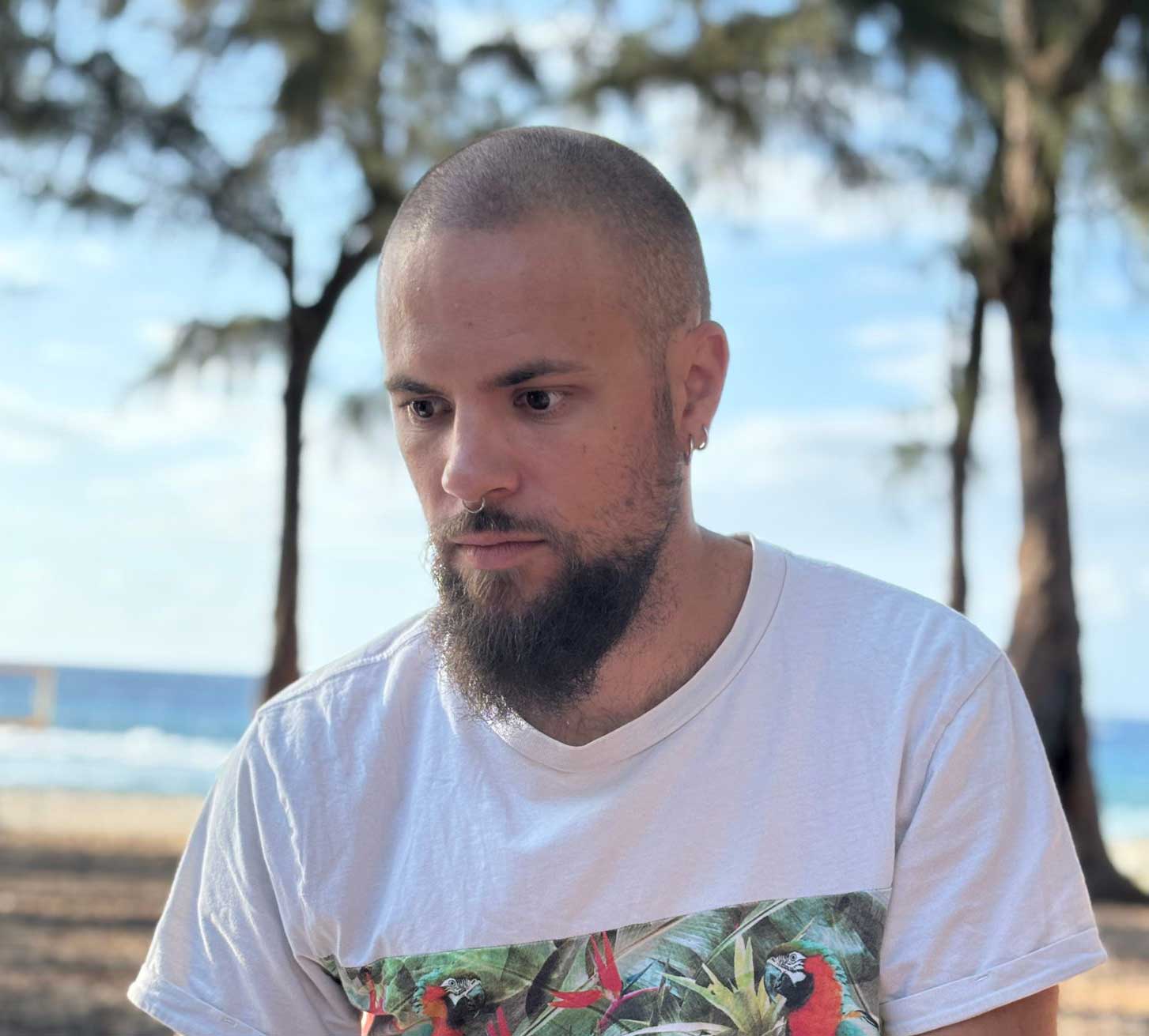 photo of a white man at the beach