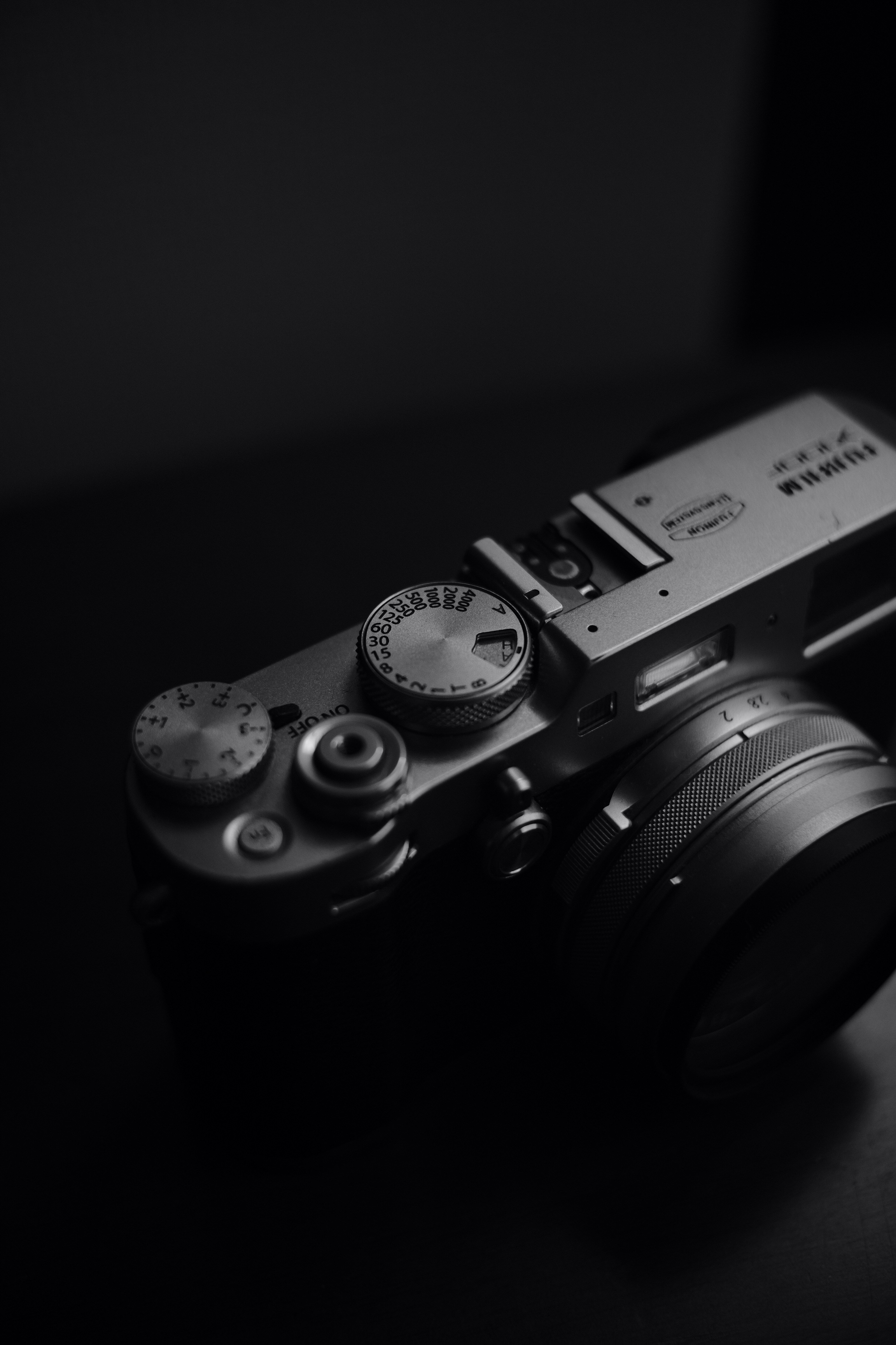 a black and white photo of a camera