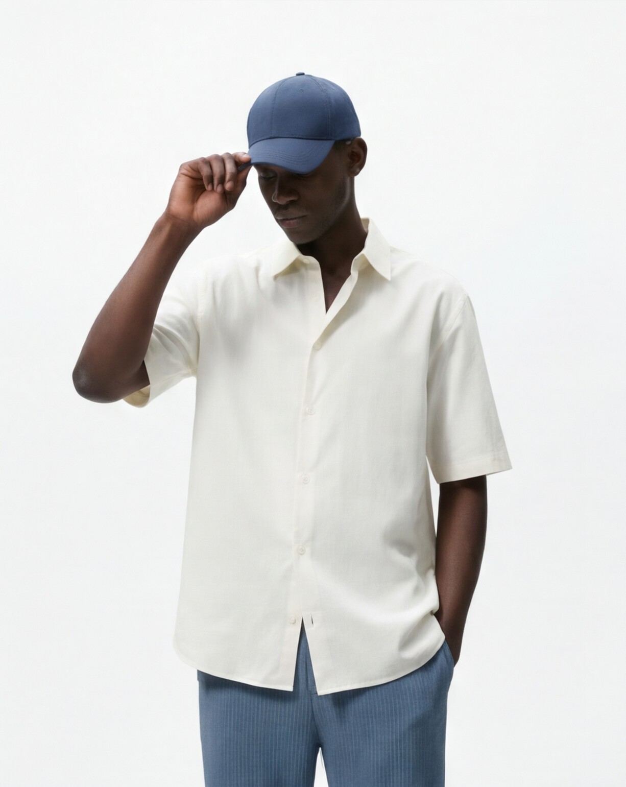 Cream Short Sleeve Shirt with Textured Blue Trousers