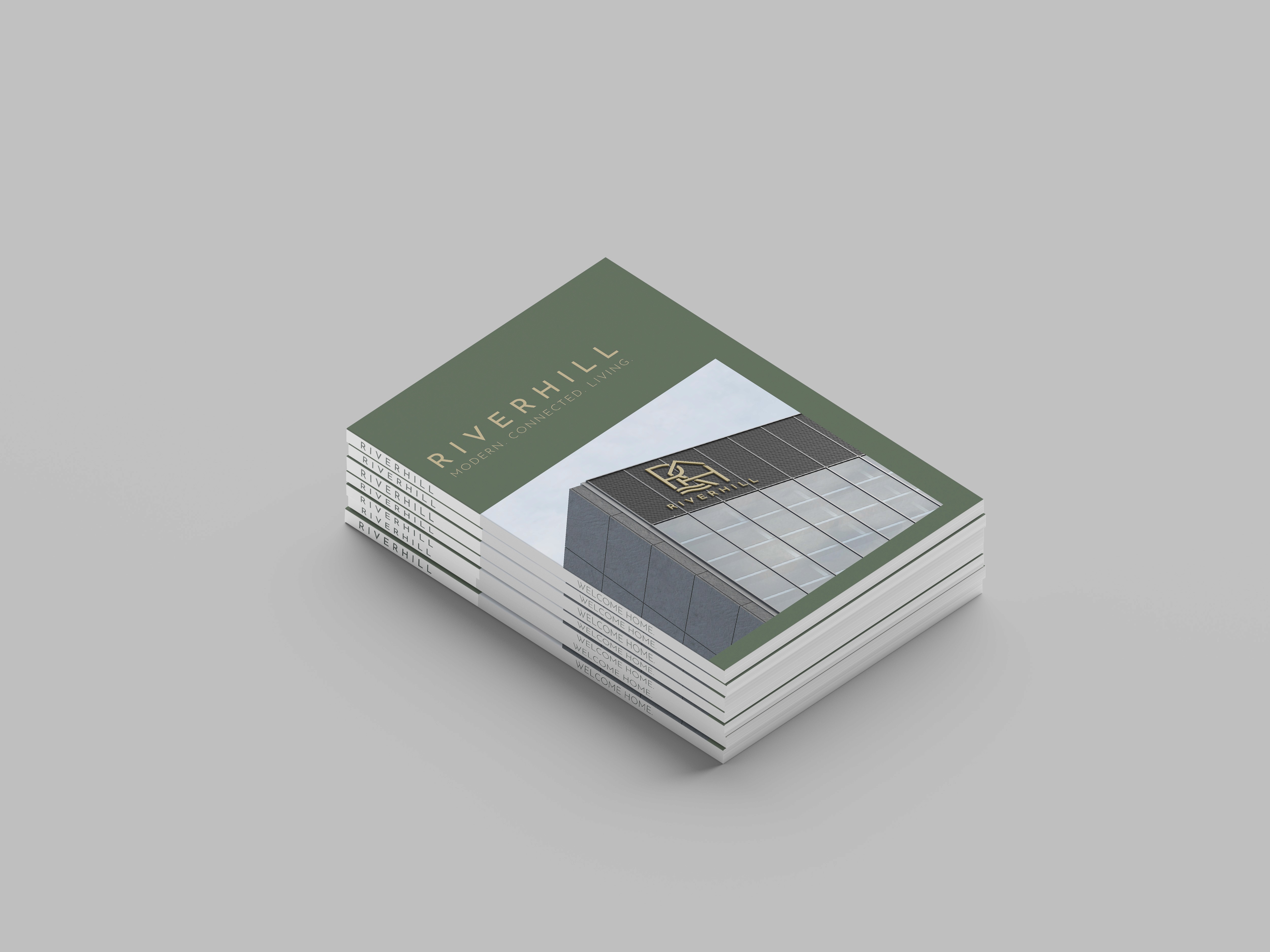 Graphic design mockup of an pamphlet for the Riverhill housing community— modern, geometric brandmark logo integrating the brand name initials, a house, and a river with a clean sans serif typography, designed by Will Lefkovich.