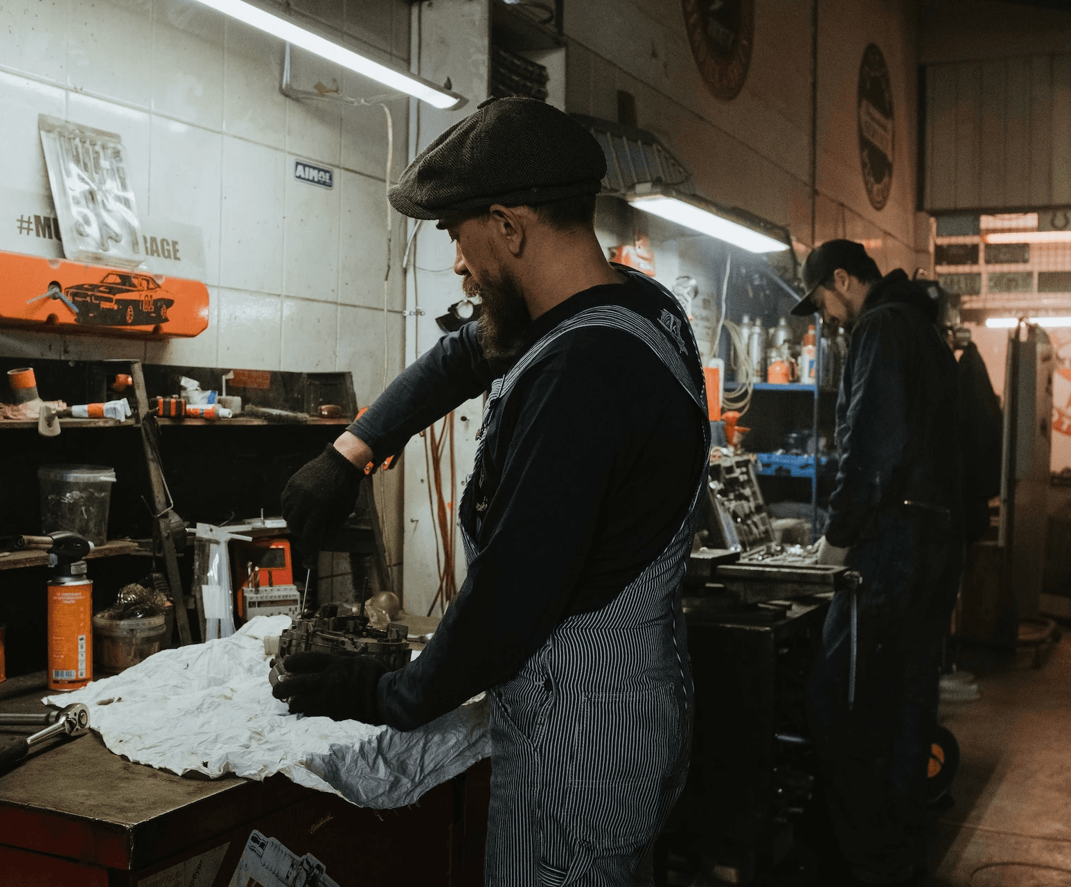 Mechanics working at shop balcony