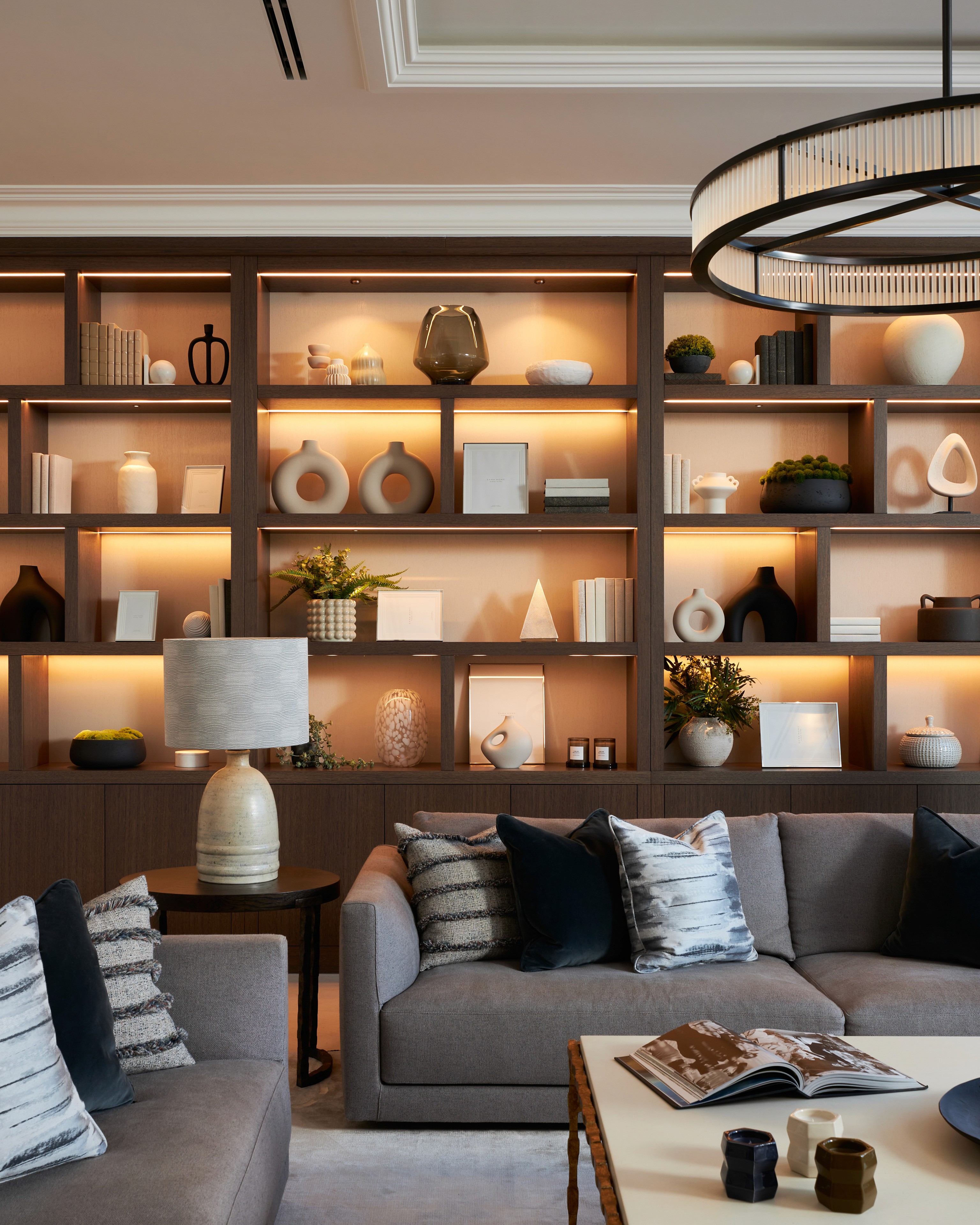 Open display stained oak shelving with backlit LED lighting