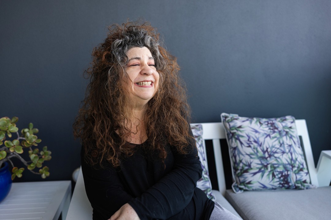 Nancy Hansch smiling with eyes closed