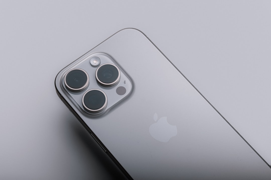 A close up of an apple phone on a table