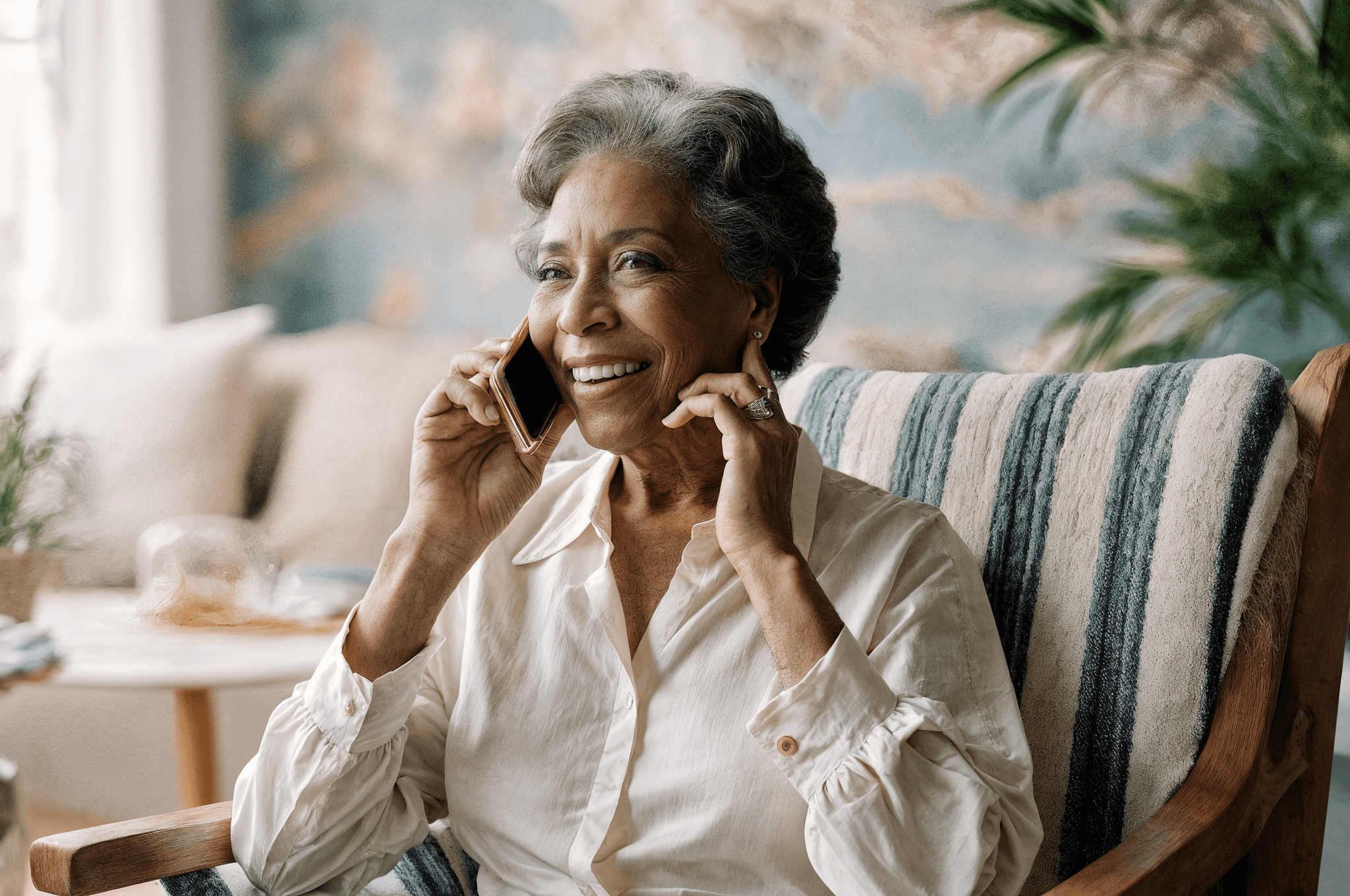 two people in a workspace working on their laptops