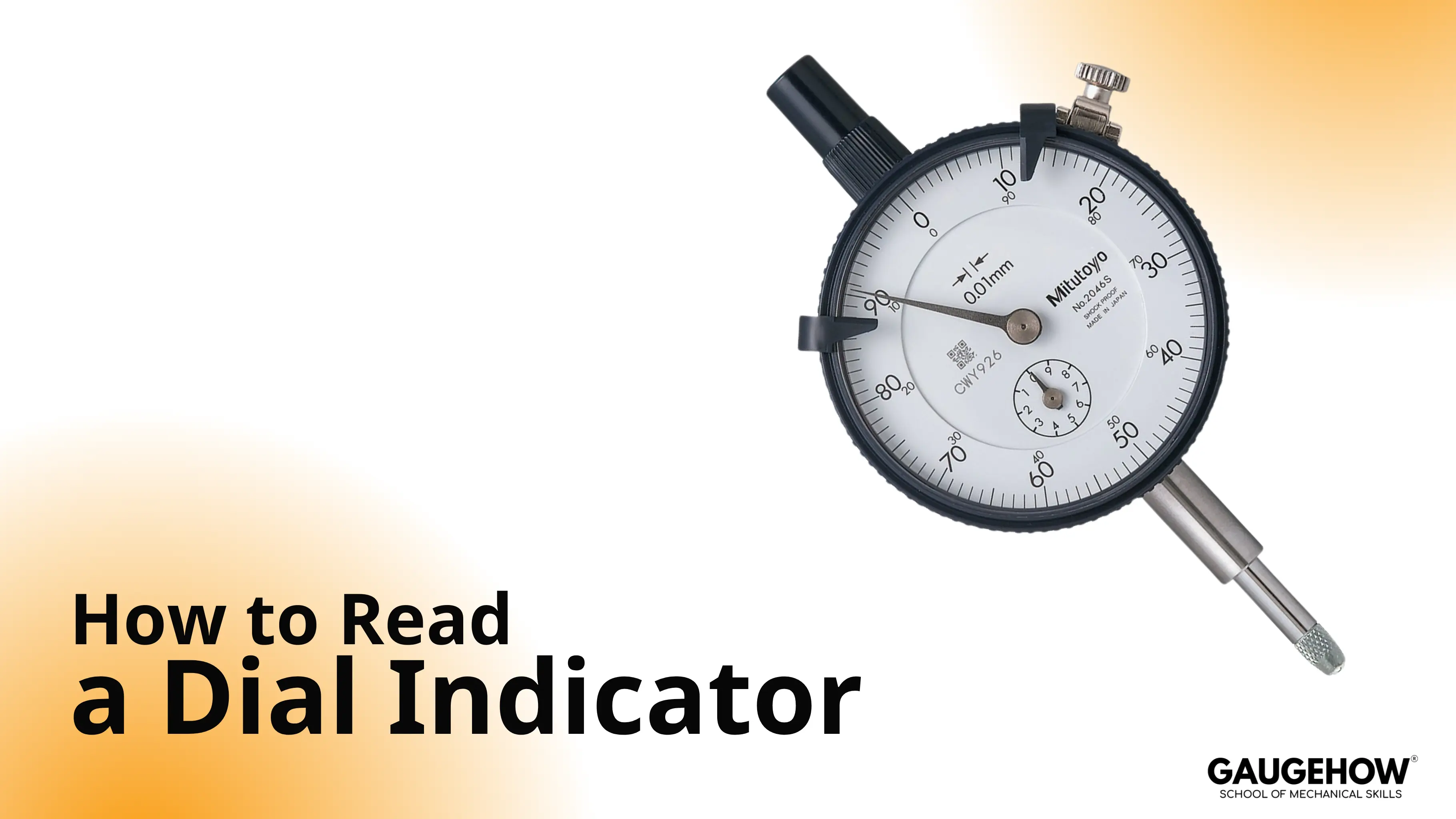 Dial indicator close-up showing main dial scale and plunger