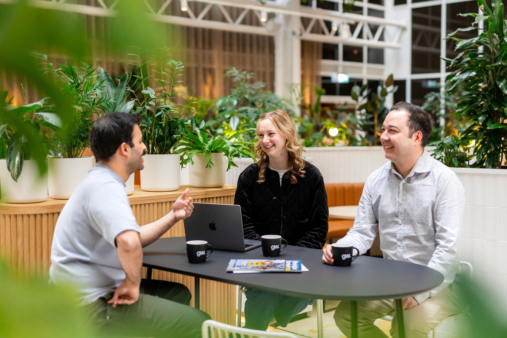 Woman looking at metrics on the computer