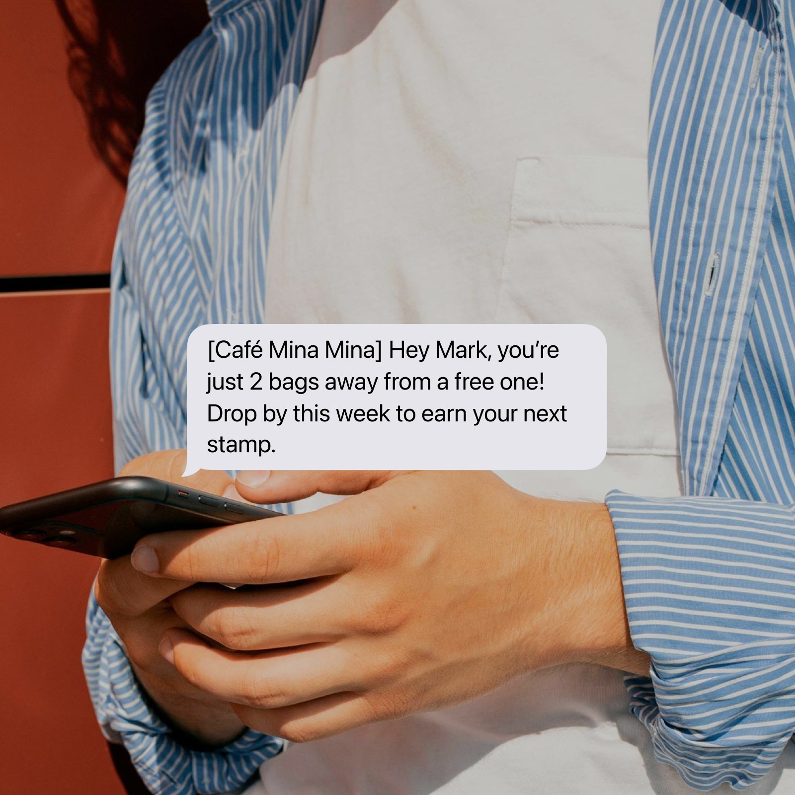 two ladies looking at a laptop and smiling