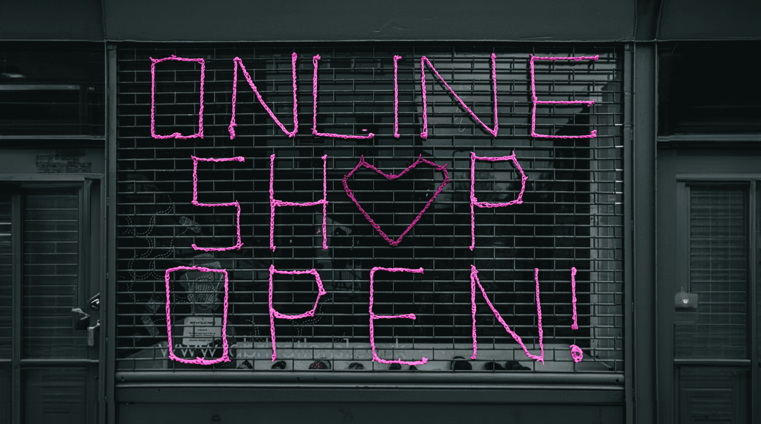 Storefront that says "Online shop Open!"