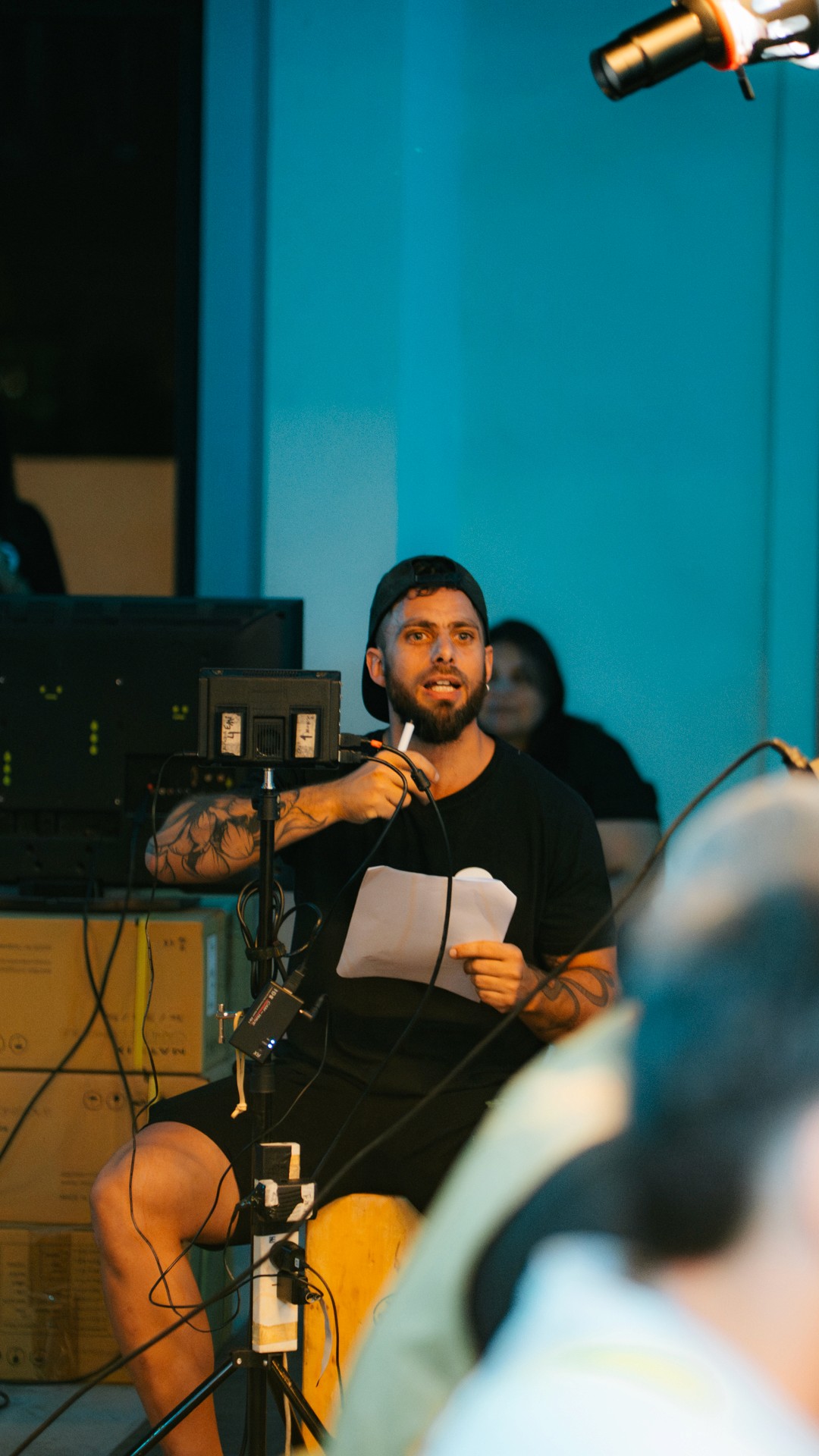 The image captures the ethereal beauty of an underwater cave illuminated by sunbeams penetrating through an opening above.