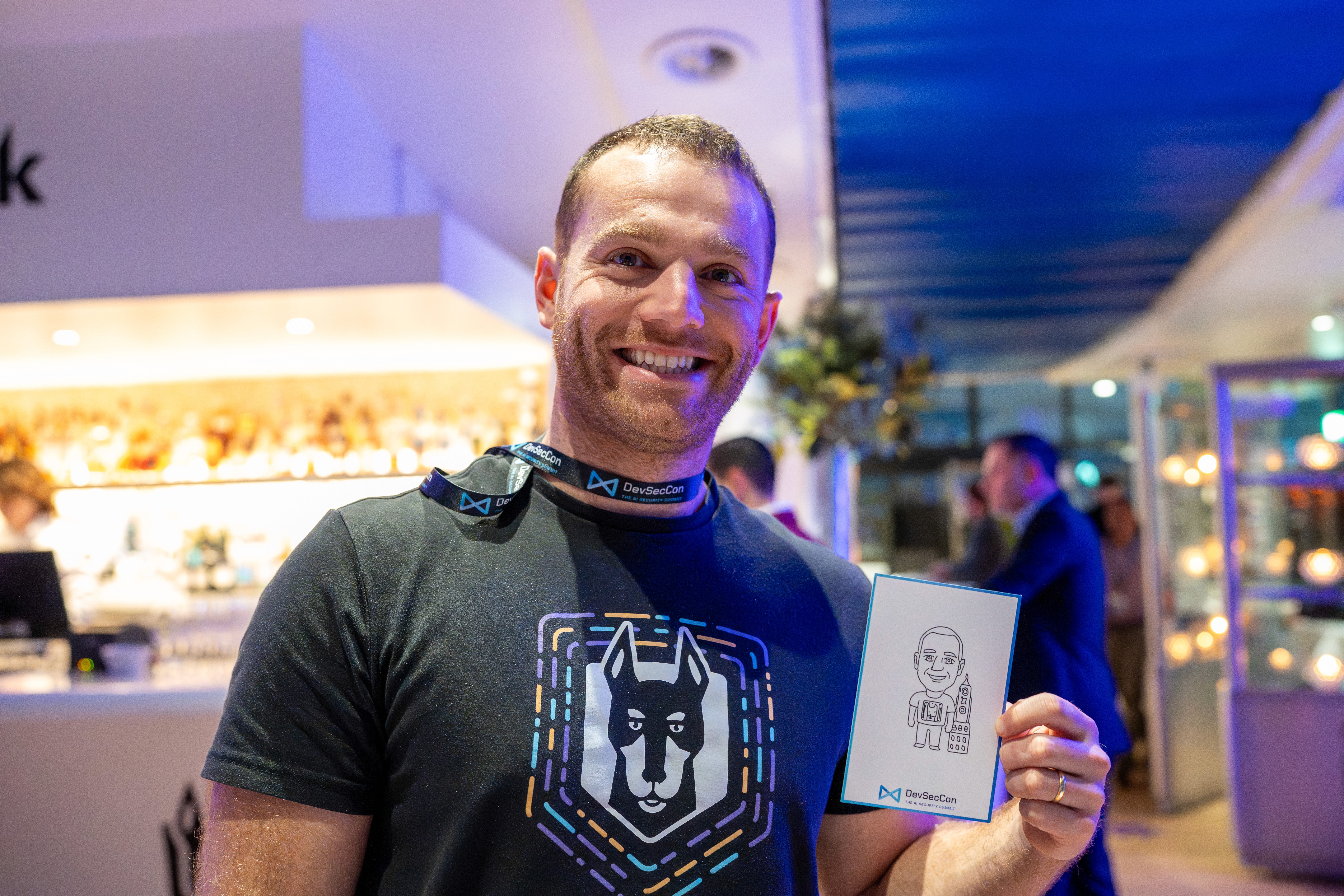 A man stading with Surfboard