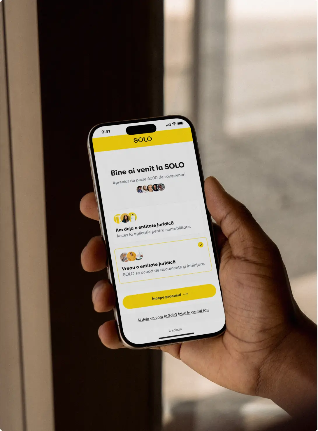 A street bilboard showing 2 different smiling people