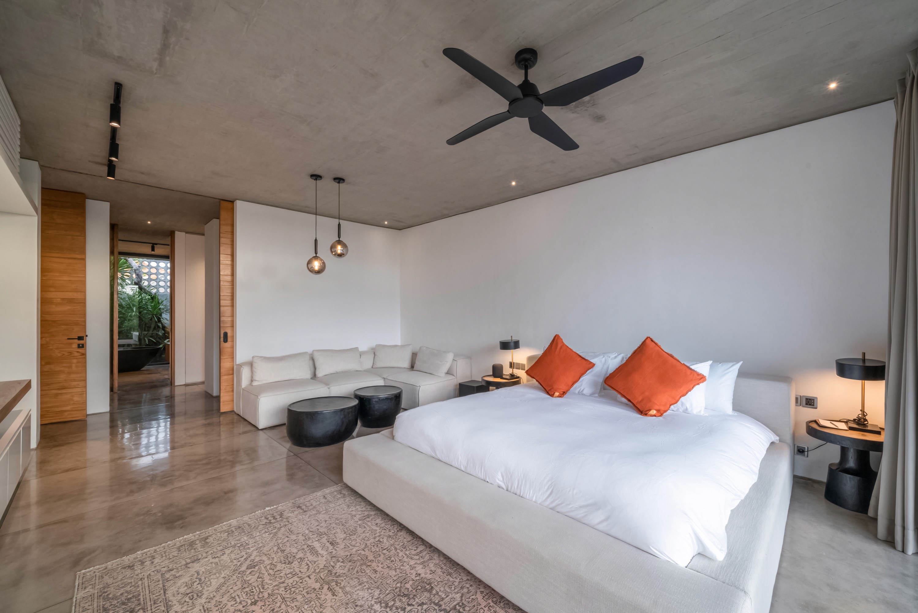 Classic bedroom with canopy bed and patterned pillows