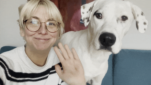 gif of Erica and her dog Ruf on the couch 