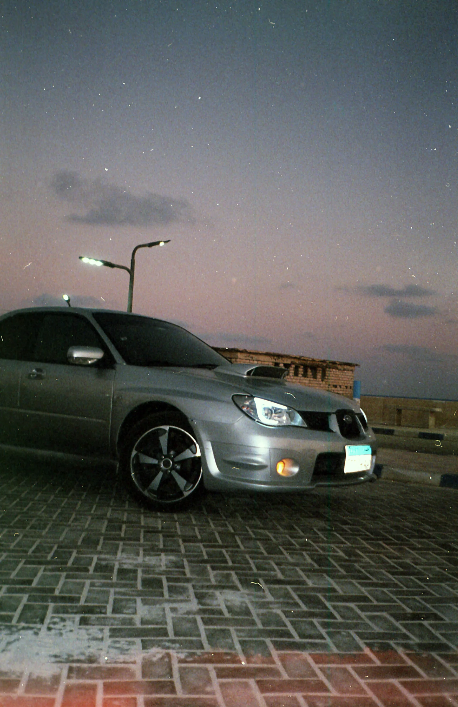 Car Under a Pink Sky