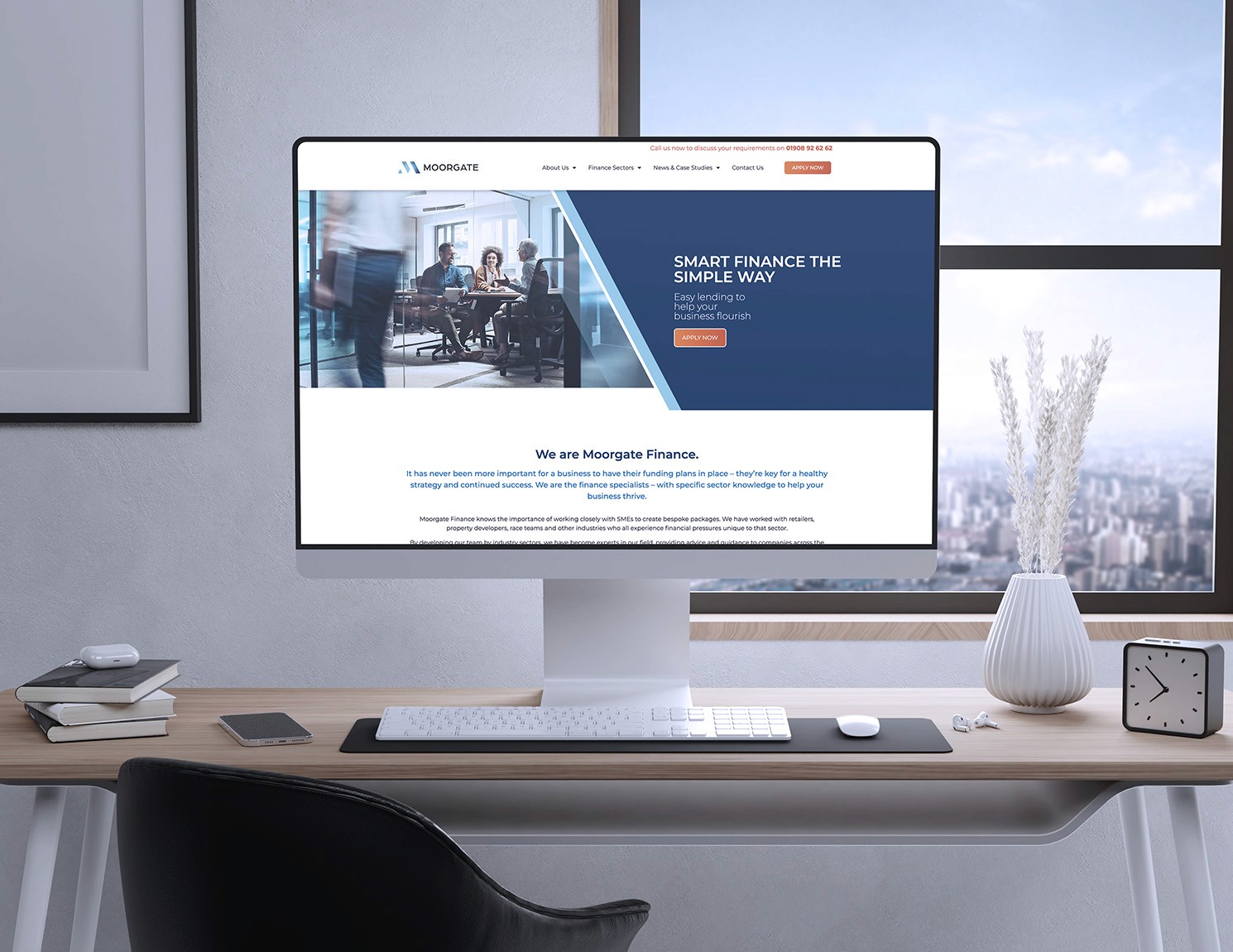Mockup of Moorgate Finance homepage on iMac screen