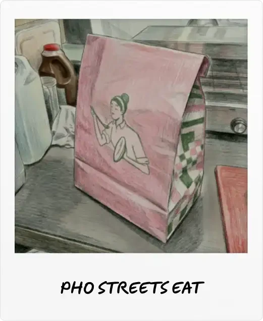 Pho Street Eats Polaroid of a pink takeaway bag printed with a woman holding a bowl, sitting on a prep counter.