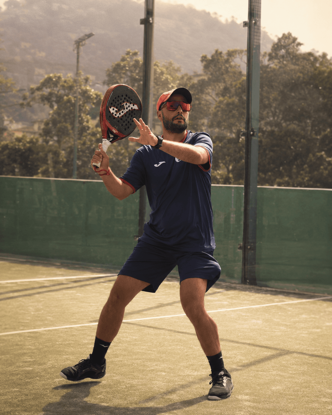 Diego Garcia coaching on a padel court at Los Príncipes