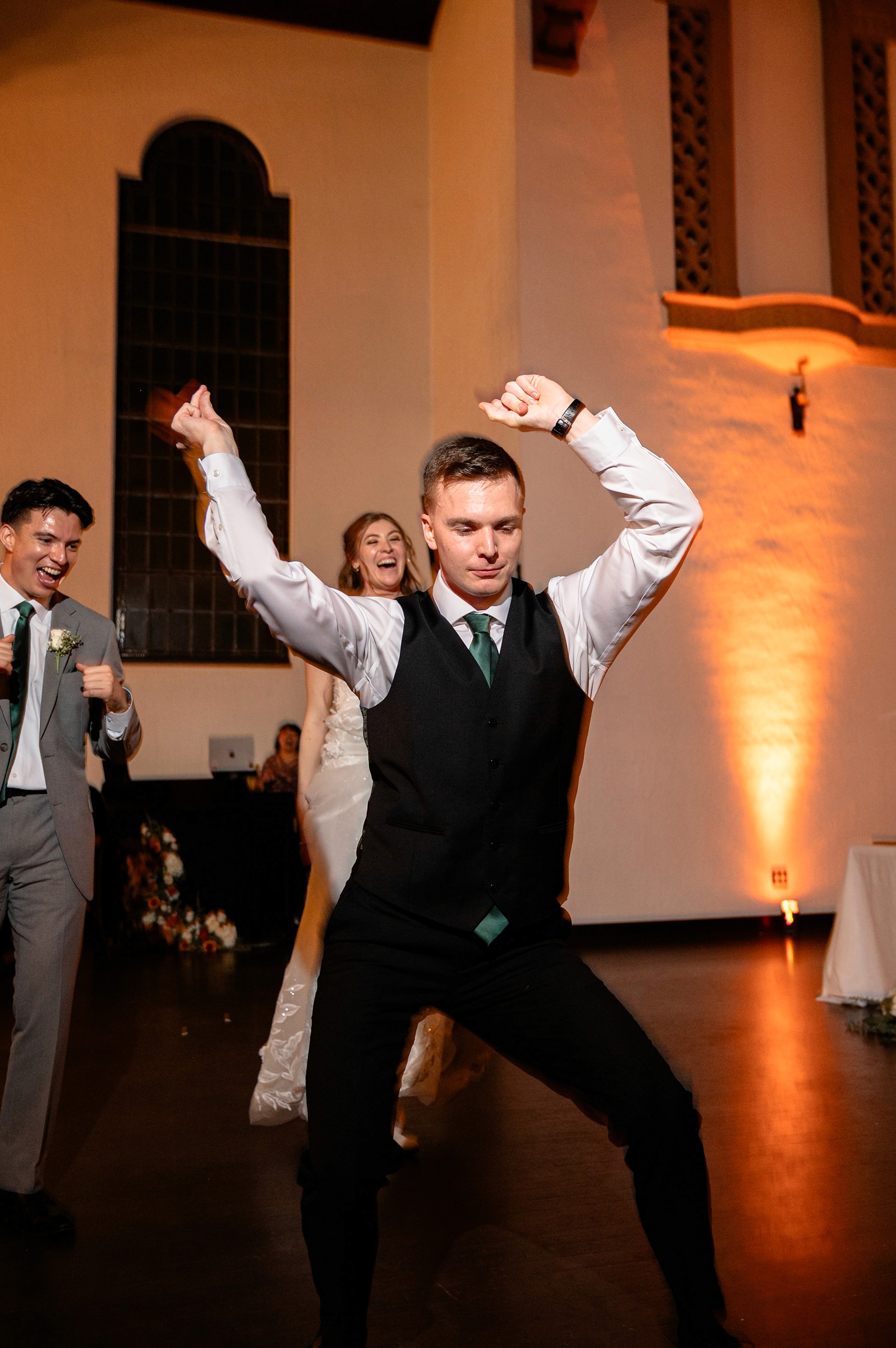 Flat lay wedding details with bouquet, rings, and sparkling bridal heels