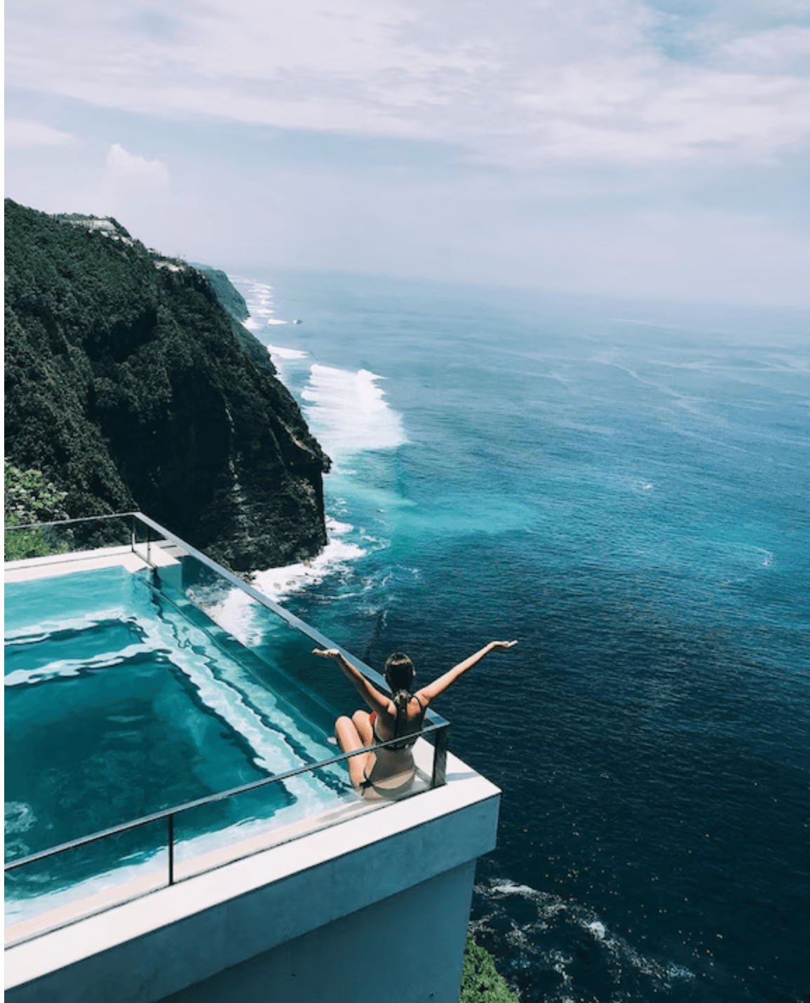 A beach with a bunch of umbrellas on it